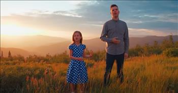 <p>Revel in God&rsquo;s creations as this father-daughter duo performs a stunning rendition of &lsquo;America The Beautiful.&rsquo;</p>

<p>Samuel Ward originally composed this beloved classic in 1883. A few years later, Katharine Lee Bates added the lyrics that we know and love today.</p>

<p>&lsquo;O beautiful for spacious skies,<br />
For amber waves of grain,<br />
For purple mountain majesties<br />
Above the fruited plain!&rsquo;</p>

<p>You may recognize 9-year-old Claire from one of her many viral videos. Claire and her dad became Internet sensations after their precious duet &#39;You&#39;ve Got A Friend In Me&#39; went viral in 2017. Since that time, Claire has been keeping busy with a successful YouTube channel where she sings and showcases fun times with her family.</p>

<p>Claire has also made appearances on The Voice, The Ellen DeGeneres Show and many more.</p>

<p>Today, she has her dad by her side for an incredible performance of &lsquo;America The Beautiful.&rsquo; Just listen as they belt out these lyrics set against the most stunning backdrop.&nbsp;</p>

<p>&lsquo;America! America!<br />
God shed His grace on thee<br />
And crown thy good with brotherhood<br />
From sea to shining sea!&rsquo;</p>

<p>What a blessing to hear this duo honor our country in such a beautiful way.</p>

<p>As you hear these words, remember that God surrounds each and every one of us. And when we honor His word, He will bless our nation. We are God&rsquo;s chosen people and it is our duty to stand for His truth.</p>

<p><em><a href="https://www.godtube.com/bible/psalms/33-12">Psalm 33:12</a> &ldquo;Blessed is the nation whose God is the LORD, the people whom he has chosen as his heritage!&rdquo;</em></p>
