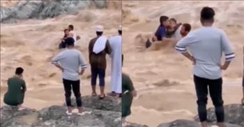 <p>Check out the incredible 27-second video shared here by Sunny Skyz, and watch how a hero saves 2 children from drowning in raging waters!&nbsp;</p>

<p>Though it&rsquo;s a short video, the actions we see in the brief clip changed several lives forever! Ali bin Nasser al Wardi, with the help of his father and brother, was able to save two children, ages 8 and 13 from the rushing water of a wadi. &ldquo;Wadi&rdquo; is an Arabic word, and it refers to a valley, ravine, or channel that is typically dry. In the rainy season, however, a wadi can turn to a tumult of dangerous water, which is what we see here.&nbsp;</p>

<p>We see Ali bin Nasser al Wardi after he&rsquo;s already entered the water. He struggles to collect the children into his arms without losing his bearing. The weight of the current is evident, and it&rsquo;s easy to imagine how he might have lost his balance and been pulled under the water. It is a terrifying scene!</p>

<p>It was terrifying for Ali bin Nasser al Wardi as well, but when he saw the panic in the kids&rsquo; eyes, he knew he needed to help. Family members tied a rope around his waist, which is the only thing that kept the three from being lost to the deadly wadi!&nbsp;</p>

<p>As Ali bin Nasser al Wardi clung to the children, the men on the bank pulled the rope. Though we cannot see the rope in the video, it was critical to the rescue. When he and the youngsters were close enough to grab from the bank, they were helped out and onto the safety of dry land. It must have been a heroing experience, Ali bin Nasser al Wardi slipping and fighting the flash flooding the entire time!</p>

<p><a href="https://timesofoman.com/article/118344-man-risks-life-to-save-two-children-stuck-in-a-wadi-in-oman">The Times of Oman</a> shared Ali bin Nasser al Wardi&rsquo;s words of appreciation. &ldquo;I thank God for having enabled me to save the two children, and I thank Him for His great bounty and great gratitude for having made me a medium to save the two children,&rdquo; he said.&nbsp;</p>

<p><em>&ldquo;Have I not commanded you? Be strong and courageous. Do not be afraid; do not be discouraged, for the Lord your God will be with you wherever you go.&rdquo; <a href="https://www.godtube.com/bible/joshua/1-9">Joshua 1:9</a></em></p>
