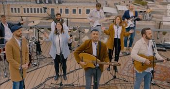 <p>Watch this moving music video of musicians performing the worship song &lsquo;Above All&rsquo; in Hebrew, Arabic, and English.</p>

<p>&ldquo;Above all powers, above all kings, above all nature and all created things<br />
Above all wisdom and all the ways of man, You were here before the world began<br />
Above all kingdoms, above all thrones, above all wonders the world has ever known<br />
Above all wealth and treasures of the Earth, there's no way to measure what You're worth&rdquo;</p>

<p>This popular worship song by Michael W. Smith was performed by a group with the One For Israel ministry. The talented musicians sang the song on a rooftop in Jerusalem, Israel where they worshiped the Prince of Peace together in Hebrew, Arabic, and English.</p>

<p>Some of the singers in the video are Joshua Aaron, Nizar Francis, and Shilo Ben Hod. And the musicians in the group are playing different guitars and drums on the roof.</p>

<p>The song starts off in English, then goes to Arabic, and finally Hebrew. Then all of the languages are sung together &ndash; what a beautiful thing to hear and a glimpse of what our worship of the Lord at His throne will be like!</p>

<p>&ldquo;This is the most beautiful song and styles of singing together -- it's worthy of many joyful tears. Glory to our God,&rdquo; <a href="https://www.youtube.com/watch?v=LtcxE4xF5So">comments</a> one person after watching the music video.</p>

<p>&ldquo;When worship is straight from the heart. The language we speak is one in the spirit,&rdquo; <a href="https://www.youtube.com/watch?v=LtcxE4xF5So">writes</a> another person online.</p>

<p>We hope that you enjoyed this multicultural worship set of the song &lsquo;Above All.&rsquo; May it uplift you and encourage you today!</p>

<p><em><a href="https://www.godtube.com/bible/colossians/3-16">Colossians 3:16</a><br />
Let the message of Christ dwell among you richly as you teach and admonish one another with all wisdom through psalms, hymns, and songs from the Spirit, singing to God with gratitude in your hearts.</em></p>
