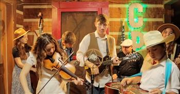 <p>This is a talented group of young people playing their instruments. Check out this video of the Cotton Pickin&rsquo; Kids performing a toe-tapping cover of &ldquo;Wagon Wheel.&rdquo;</p>

<p>If you are a BlueGrass fan, this video clip is for you. This family band is made up of six kids from the ages of 12-19.&nbsp;</p>

<p>They play fiddle, bass, mandolin, banjo, guitar, and lap steel guitar. The oldest brother kicks the group off for their performance. The banjo player steps up and begins to sing as all the children play their instruments together. It is precious.</p>

<p>The three brothers sing in harmony with one another. Then each instrument truly has a shining moment. These kids have clearly worked very hard on learning this song together. It must have taken a lot of patience and teamwork.&nbsp;</p>

<p>The fiddler comes up to the mic and plays an incredible solo. Then, the youngest boy does an impressive solo on the lap guitar. Their music makes you want to dance.&nbsp;</p>

<p>Watching these young people perform a task with a certain goal is inspiring. It reminds us that we, too, can accomplish great things when we are unified and focused. With the help of God, we can get away from being self-focused and get back to leaning on the Lord as a community.&nbsp;</p>

<p>We know that we are not in competition with one another, but we each have a part to play in the ways that God has gifted us. We are motivated to do our best and to serve alongside those around us.</p>

<p><em>&ldquo;Finally, brothers and sisters, rejoice! Strive for full restoration, encourage one another, be of one mind, live in peace. And the God of love and peace will be with you.&rdquo; <a href="https://www.godtube.com/bible/2-Corinthians/13-12">2 Corinthians 13:12</a></em></p>
