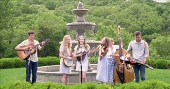 <p>Check out this talented Bluegrass family band sing the Beatles classic, &lsquo;Here Comes The Sun.&rsquo;</p>

<p>&ldquo;Here comes the sun (doo-doo-doo-doo), here comes the sun, and I say<br />
It's all right, little darling, it's been a long cold lonely winter, little darling<br />
It feels like years since it's been here, here comes the sun<br />
Here comes the sun, and I say, it's all right&rdquo;</p>

<p>What a wonderful cover by The Petersens of this iconic song loved by so many! In the music video, the family is playing in front of a fountain on a bright, sunny day. And all the vocals and harmonies and instruments sound so amazing making music together! This is definitely a happy video that will bring a smile to your face.</p>

<p>&ldquo;Every time I think The Petersens can't get better and their repertoire can't get wider, I have to go to back to the drawing board as yet another stunning rendition of a song comes out. Thank you!&rdquo; <a href="https://www.youtube.com/watch?v=DF5emO1X0HA">comments</a> one person on YouTube after watching the music video.</p>

<p>&ldquo;Great arrangement, lovely harmonies, and nice bass playing and playing from the instrumentalists all round. Nailed it!&rdquo; <a href="https://www.youtube.com/watch?v=DF5emO1X0HA">writes</a> another person online.</p>

<p>On their YouTube <a href="https://www.youtube.com/watch?v=DF5emO1X0HA">page</a>, The Petersens write, &ldquo;we celebrate American roots music with family values, and perform full time in Branson, Missouri in the USA. The band consists of four siblings, Katie, Ellen, Matt, and Julianne, our mom Karen, and good friend Emmett Franz.&rdquo;</p>

<p>Julianne is the sibling that is singing in this particular video, and she sounds amazing! Her voice suits the song so well, and the harmonies done by her sisters, Katie and Ellen, are just lovely. What a talented and special family making great music and spreading joy to those around them!</p>

<p>We hope that you enjoyed listening to The Petersens&rsquo; cover of &lsquo;Here Comes The Sun&rsquo; today!</p>

