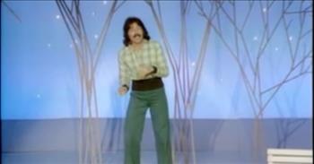 <p>If you have been on this earth for a certain number of years, this classic 1973 performance of &ldquo;Tie a Yellow Ribbon Round the Old Oak Tree&rdquo; is bound to make you smile! (And if you haven&rsquo;t, you&rsquo;re in for a treat!)</p>

<p>From the archives comes this footage of Dawn singing at The Hollywood Palace on Vine St.in Los Angeles. Notice that the group is introduced as just Dawn because in the early days, Tony Orlando&rsquo;s name wasn&rsquo;t part of the <a href="https://en.wikipedia.org/wiki/Tony_Orlando">group name</a>. Who knew! But, by the end of 1973, Dawn had become Tony Orlando and Dawn&mdash;the name we all know and remember!</p>

<p>There are just so many things to love about this piece of video! Tony Orlando strolls super casually onto the stage, donning slim, green polyester pants, a banded-bottom shirt, black platform shoes, a generous &lsquo;stache, and long dark hair. He is the epitome of 1970s cool!&nbsp;</p>

<p>As the chorus begins, <a href="https://en.wikipedia.org/wiki/Tony_Orlando_and_Dawn">Telma Hopkins and Joyce Vincent Wilson</a> join Tony. The two gently sway and snap their fingers and provide their parts at just the right moments. Their dress and behavior are modest and demure, vastly different from artists of today!</p>

<p>The set is simple, but as the three mosey over behind the white bench, the story in the song gets suspenseful! A young man has been in jail for three long years. He&rsquo;s coming home and wants to return to his love, but will she have him?&nbsp;</p>

<p>If she will, she&rsquo;s to put a yellow ribbon around the oak tree, clearly, one they both know well. If she won&rsquo;t, there&#39;ll be no ribbon, and he&rsquo;ll stay on the bus, broken-hearted.&nbsp;</p>

<p>The ladies take a seat on the bench, and after a few lovely instrumental moments, Tony Orlando sings us out of suspense and into goose-bumpy goodness. You know how it ends! The bus is cheering because there isn&rsquo;t one yellow ribbon&mdash;there are a hundred! And he&rsquo;s coming home!</p>

<p>With ordinary but stylish clothing and without anything fancy or flashy, Tony Orlando and Dawn delivered a performance that relies on the music and the words! What a sweet one it was!&nbsp;</p>

<p><em>&ldquo;I also want the women to dress modestly, with decency and propriety, adorning themselves, not with elaborate hairstyles or gold or pearls or expensive clothes,&rdquo; <a href="https://www.godtube.com/bible/1-timothy/2-9">1 Timothy 2:9</a></em></p>
