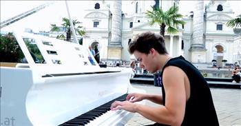 <p>This is an epic viral video of pure talent. A street piano player performs a mesmerizing Hans Zimmer song.</p>

<p>Peter Buka wows us as he sits at a stunning white piano and plays the keys in the streets. His skills are incredible, and he plays with such intentionality and passion.&nbsp;</p>

<p>Peter has poise and intensity about him. He has great crescendos and decrescendos. What is even more incredible is that he plays the entire piece by ear. It is almost as if his fingers dance on the keys. He knows when to hit with power and when to pull back with such softness and tenderness.</p>

<p>Peter has a crowd of people around him videos and standing in awe. His skill is more than just good. He is amazing.&nbsp;</p>

<p>He is easy to listen to and fun to watch as he entertains while he is investing in the song with passion. He takes you to new levels with his song that tells a story and takes you on a journey.&nbsp;</p>

<p>Peter plays on a Feurich piano in the streets of asdf. He has so much going on with both hands as he plays, but he never misses a beat. He plays this masterpiece with perfection. I could listen to him for hours. As he ends his piece, he pulls away, and the audience claps.&nbsp;</p>

<p>Seeing such skills and hard work present itself reminds us of giving our best for the glory of God. He has gifted us each in significant ways, and we are able to make choices to cultivate those talents or let them sit. Peter clearly practices and spends his time investing in piano, and he is absolutely magnificent at it.</p>

<p><em>&ldquo;And whatever you do, whether in word or deed, do it all in the name of the Lord Jesus, giving thanks to God the Father through him.&rdquo; <a href="https://www.godtube.com/bible/Colossians/3-17">Colossians 3:17</a></em></p>
