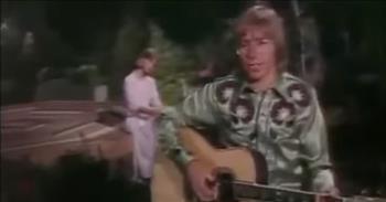<p>It&rsquo;s all about the words and the simple delivery of the song in this 1976 performance of John Denver and Olivia Newton-John&rsquo;s singing &ldquo;<a href="https://en.wikipedia.org/wiki/Fly_Away_(John_Denver_song)">Fly Away.</a>&rdquo; Without any showy vocal tricks, the song relies completely on the message and the beauty of the voices. And, &ldquo;Fly Away&rdquo; is truly a beautiful song, written in 1975 by <a href="https://en.wikipedia.org/wiki/John_Denver">John Denver</a>, who penned and composed approximately 200 songs in his lifetime.</p>

<p>Folks have <a href="https://www.lyricinterpretations.com/john-denver/fly-away">speculated on the meaning</a> behind the song. Was it written about a woman wanting to escape the city and get back to a rural community? Is it a statement about mental health and depression? Could it be about a woman experiencing dementia or Alzheimer&rsquo;s? It seems certain that loneliness is at the center of the song, and the two artists convey the feeling wonderfully.&nbsp;&nbsp;</p>

<p>Here are a <a href="https://songmeanings.com/songs/view/3530822107858753901/">few lines</a> from &ldquo;Fly Away&rdquo;:</p>

<p>All of her days have gone soft and cloudy<br />
All of her dreams have gone dry<br />
All of her nights have gone sad and shady<br />
She&#39;s getting ready to fly</p>

<p>Whatever the interpretation, there is a sadness in the song. There is a sadness, too, as we watch these two performers, John Denver and <a href="https://en.wikipedia.org/wiki/Olivia_Newton-John">Olivia Newton-John</a>, 35 and 28 at the time, respectively. Both always appeared to be warm, caring, honest, and genuine individuals. Both are now gone.</p>

<p>John Denver died at the age of 53 as a result of an accidental plane crash; he was an experienced pilot. Olivia Newton-John, much more recently, died at 73 after a long battle with cancer.&nbsp;&nbsp;</p>

<p>This performance from John Denver&rsquo;s 1976 Christmas Special is noticeably missing stuff&mdash;red and green filling the screen, a fancy set, lavish costumes, and really anything &ldquo;extra.&rdquo; That is what makes it so very special. All we experience is the warmth, the caring, the honesty, and the genuine human situation that&rsquo;s being described in John Denver&rsquo;s ballad.&nbsp;</p>

<p>Legions of fans around the world have experienced a touch of loneliness with the loss of these two brilliant artists, but Heaven is no doubt enriched!</p>

<p><em>&ldquo;You are my hiding place; you will protect me from trouble and surround me with songs of deliverance.&rdquo; <a href="https://www.godtube.com/bible/psalms/32-7">Psalms 32:7</a></em></p>
