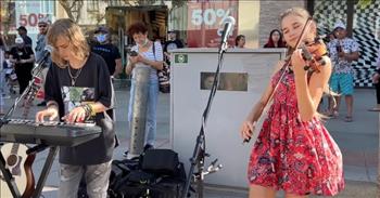 <p>Check out these two talented teen street performers play &lsquo;Let It Be&rsquo; by The Beatles, and watch the audience sing along!</p>

<p>&ldquo;When I find myself in times of trouble, Mother Mary comes to me<br />
Speaking words of wisdom, let it be, and in my hour of darkness<br />
She is standing right in front of me, speaking words of wisdom, let it be<br />
Let it be, let it be, let it be, let it be, whisper words of wisdom, let it be&rdquo;</p>

<p>The teen violinist is Karolina Protsenko, and she is playing with Oscar Stembridge.</p>

<p>&ldquo;My violin cover of &lsquo;Let It Be&rsquo; (original by The Beatles) with Oscar Stembridge. His voice is angelic,&rdquo; Karolina writes in the <a href="https://www.youtube.com/watch?v=gA0szLcN11A">caption</a> of this YouTube video. &ldquo;Look at people&#39;s incredible reaction. They were singing along. Oscar came from Sweden to Santa Monica, California where we performed together. I hope you like it.&rdquo;</p>

<p>As you watch these two perform together, you cannot help but smile at their impressive talent. Their rendition of &lsquo;Let It Be&rsquo; is beautiful and inspiring, and both of their vocals were top notch. Not to mention their fantastic piano and violin playing! No wonder this video went viral online!</p>

<p>&ldquo;I am thunderstruck by so much talent in these amazing youngsters! What a bright future is in store for them - and us too!&rdquo; <a href="https://www.youtube.com/watch?v=gA0szLcN11A">comments</a> one person on YouTube after watching the video.</p>

<p>&ldquo;Great job! Love how everyone joined in. That is a huge compliment to the performers when onlookers join in. Keep up the beautiful performances,&rdquo; <a href="https://www.youtube.com/watch?v=gA0szLcN11A">writes</a> another person online.</p>

<p>The song &lsquo;Let It Be&rsquo; was part of the album of the same title by The Beatles. It was the 12th and final studio album for the group, and it was released in May 1970.</p>

<p>We hope that you enjoyed this wonderful version of &lsquo;Let It Be&rsquo; by Karolina and Oscar and their performance was able to bring a smile to your face.</p>
