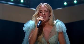 <p>Carrie Underwood sings a heartfelt rendition of &lsquo;Go Rest High On That Mountain&rsquo; in honor of Vince Gill.</p>

<p>&lsquo;Go Rest High On That Mountain&rsquo; was made famous by Vince back in the 1990s. He started writing the song back in 1989 after the death of fellow country artist Keith Whitley.</p>

<p>Despite being inspired to write down the lyrics, it would take years before Vince was able to finally finish the special tune. Once the song was released, it quickly climbed to the top of the music charts.</p>

<p>&lsquo;Go Rest High On That Mountain&rsquo; went on to win 2 Grammy awards and the Country Music Association's Song of the Year award in 1996. Over the years, the lyrics of the song have provided peace and comfort to many hearts around the world.</p>

<p>&ldquo;Go rest high on that mountain<br />
Son, your work on earth is done.<br />
Go to heaven a-shoutin'<br />
Love for the Father and the Son.&rdquo;</p>

<p>Today, Carrie Underwood is putting her own spin on this Vince Gill classic for the CMT Giants special.</p>

<p>Carrie became a household name after winning the fourth season of American Idol back in 2005. She won over the hearts of America with covers of songs such as Bonnie Raitt's &lsquo;I Can't Make You Love Me&rsquo; and &lsquo;Bless The Broken Road&rsquo; from Rascal Flatts.</p>

<p>After her win, she quickly climbed the country charts and made a solid name for herself in the country music world. It&rsquo;s been 16 years since that momentous audition and Carrie is still using her gift to touch our hearts.</p>

<p>Just listen as she belts out these iconic words to honor her friend, and legend, Vince Gill.</p>

<p>&ldquo;Our lives are better left to chance<br />
I could have missed the pain<br />
But I'd have had to miss the dance&rdquo;</p>

<p>What a beautiful performance to honor this incomparable country superstar.</p>
