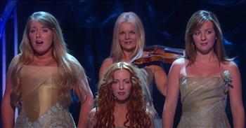 <p>Prepare for goosebumps as the angelic vocals of Celtic Woman perform &lsquo;You&rsquo;ll Never Walk Alone.</p>

<p>&nbsp;</p>

<p>This iconic song was originally a show tune from the musical Carousel. Talented composers Richard Rodgers and Oscar Hammerstein wrote the song in 1945.</p>

<p>&nbsp;</p>

<p>In later years, other artists lent their vocals to the tune and gave it mainstream media attention. Elvis Presley released his rendition of the single in 1967 and even titled his album after the song.</p>

<p>&nbsp;</p>

<p>&ldquo;When you walk through a storm hold your head up high</p>

<p>And don't be afraid of the dark.</p>

<p>At the end of a storm is a golden sky</p>

<p>And the sweet silver song of a lark.&rdquo;</p>

<p>&nbsp;</p>

<p>Today, the amazing vocalists of Celtic Woman are putting their own spin on this beloved tune. This incredible all-female group comes from the creators of Riverdance.</p>

<p>&nbsp;</p>

<p>Over the years, Celtic Woman has introduced millions to the sounds of Ireland and, in the process, become a global phenomenon. Their pure tones and hauntingly beautiful harmonies put them in a league all their own.</p>

<p>&nbsp;</p>

<p>Just listen as they belt out the words to &lsquo;You&rsquo;ll Never Walk Alone.&rsquo;</p>

<p>&nbsp;</p>

<p>&ldquo;Tho' your dreams be tossed and blown.</p>

<p>Walk on, walk on with hope in your heart</p>

<p>And you'll never walk alone,<br />
You'll never, ever walk alone.&rdquo;</p>

<p>These lyrics always make me think of our Lord and His constant presence in our lives. He walks with us each step of the way and we can rest assured that He will always be there to guide us home.</p>

<p><em><a href="https://www.godtube.com/bible/job/11-18">Job 11:18 </a>&ldquo;And you shall be secure, because there is hope; yes, you shall dig about you, and you shall take your rest in safety.&rdquo;</em></p>
