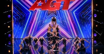 <p>Though it&rsquo;s terrifying to watch at some points, try to stay tuned as this hauntingly beautiful dance troupe stuns the crowd on Australia&rsquo;s Got Talent!&nbsp;</p>

<p>The group is called ANGELIC, but they are part of <a href="https://www.teamadrenalin.com/">Team Adrenalin</a>, which is based in <a href="https://en.wikipedia.org/wiki/Melbourne">Melbourne, Victoria, Australia</a>. Melbourne is the capital city of the state of Victoria, and it has a population of nearly 5 million people.&nbsp;</p>

<p>Guess what else. Melbourne is home to a whole bunch of athletic, flexible, fit, twisty, and flippy kids and teens! See what you think!</p>

<p>As the video starts, there are 21 team members positioned across Australia&rsquo;s Got Talent stage; three are male, and 18 are female. They look to range in age from early elementary school to college students.&nbsp;</p>

<p>They are dressed in black bodysuits and shorts, and the girls wear their hair tightly braided into side buns. The make-up is silver, their facials are somber, and the music is dark and foreboding&mdash;a mood and look that is both ghostly and alien. It&rsquo;s ironic for a group of heaven-sent gymnasts!</p>

<p>From the very beginning of the routine, it&rsquo;s hard to know where to look. So much awesomeness is going on! The performers demonstrate impeccable timing and perfectly synchronized moves; there isn&rsquo;t a spot on the floor where something magical isn&rsquo;t taking place!</p>

<p>At 25 seconds and right after the first flyer has snatched the breath of many audience members, two others do <a href="https://www.liveabout.com/cheerleading-terms-glossary-4082742#:~:text=Chant%3A%20A%20short%20cheer%2C%20with%20simple%20arm%20movements.,instructs%20or%20teaches%20a%20performer%2C%20player%2C%20or%20team.">aerials</a> across the floor, landing in just the right spots to navigate the next daring stunt! At 40 seconds, the first frightening flight takes place, and it&rsquo;s easy to imagine that cheer moms worldwide experience nerves as they watch their kids go airborne! We see little of the judges, but we do get glimpses of a couple of anxious parents and nail-biting Host Ricki-Lee Coulter.&nbsp;&nbsp;&nbsp;&nbsp;</p>

<p>By 1:30, the group falls into formation to create a human serpent. Ten ladies hold a chain of four others, strung together by their hands and feet, and they mimic a wave that rises and falls three times! A final stunt is executed from behind, and the entire team lands within moments in a pose, hands raised and heads high!&nbsp;</p>

<p>The mascot for their gym is a raging bull. He&rsquo;s red and equipped with nose rings, presumably to depict a hard-to-handle, <a href="https://faunafacts.com/cows/why-are-bulls-aggressive-and-angry/">adrenaline-filled beast</a>. The bull is printed on the shirts of two super relieved parents, who are now able to relax and breathe!&nbsp;&nbsp;</p>

<p><em>&ldquo;Then young women will dance and be glad, young men and old as well. I will turn their mourning into gladness; I will give them comfort and joy instead of sorrow.&rdquo; <a href="https://www.godtube.com/bible/jeremiah/31-13">Jeremiah 31:13</a></em></p>
