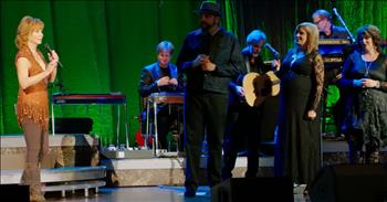 <p>Country superstar Reba McEntire and The Isaacs worship the Lord with the classic hymn &lsquo;It Is Well With My Soul.&rsquo;</p>

<p>This beloved song was written by Horatio Spafford and composed by Philip Bliss. After Horatio lost all four of his daughters, he wrote down these words as a testament of how God is with us through the good times and the bad.</p>

<p>"When peace like a river, attendeth my way,<br />
When sorrows like sea billows roll<br />
Whatever my lot, thou hast taught me to say<br />
It is well, it is well, with my soul&rdquo;</p>

<p>Reba McEntire has been a staple in the country music world for decades. With hits such as &lsquo;Fancy&rsquo; and &lsquo;I&rsquo;m A Survivor,&rsquo; Reba has truly earned her name as the &lsquo;Queen Of Country Music.&rsquo; Her classic songs and upbeat personality led to millions of fans all across the globe and there&rsquo;s no sign of slowing down.</p>

<p>Today, she&rsquo;s joined on stage by The Isaacs for a powerful rendition of &lsquo;It Is Well With My Soul.&rsquo; Just listen as their voices come together for wonderful praise to His Name.</p>

<p>"Though Satan should buffet, though trials should come,<br />
Let this blest assurance control,<br />
That Christ has regarded my helpless estate,<br />
And hath shed His own blood for my soul"</p>

<p>What a perfect reminder that God always remains by our side.</p>

<p><em><a href="https://www.godtube.com/bible/joshua/1-9">Joshua 1:9</a> &ldquo;Have not I commanded you? Be strong and of a good courage; be not afraid, neither be you dismayed: for the LORD your God is with you wherever you go.&rdquo;</em></p>
