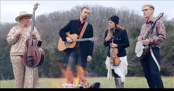 <p>Most are quite familiar with the old Christmas carol &ldquo;God Rest Ye Merry Gentlemen,&rdquo; but few have heard it done as it is here by Southern Raised. Take a listen!</p>

<p>There&rsquo;s a fire, and moments later, the first note lands almost as warm as the flame that burns in front of this talented group&mdash;like a rich, creamy, steaming cup of cocoa! Meet <a href="https://southernraisedbluegrass.com/video/about-the-band/">Matthew Reith</a>. Born in 1997, he&rsquo;s the younger brother of the two beauties that sing backup.&nbsp;</p>

<p>They are Emily, who wears an &ldquo;E&rdquo; necklace, and Lindsay, and they do a lot more than provide the &ldquo;ooo&rsquo;s&rdquo;!</p>

<p>At 55 seconds, another log is thrown on the blaze, and the instruments are added. From left to right, a bass, an acoustic guitar, a fiddle, and a banjo are fired up. By the way, that&rsquo;s Alex playing the banjo. He happens to be <a href="https://fundamentalists.fandom.com/wiki/Reith_Family#Emily's_Family">married to Emily</a>. He&rsquo;s a Missouri man, while the others hail from Rogers, Arkansas. All are from the Ozark Mountains and have been making music since they were kids!&nbsp;&nbsp;&nbsp;</p>

<p>The ladies come together to harmonize for a bit at 1:35, and you might get <a href="https://www.bing.com/videos/search?q=Soggy+Bottom+Brothers&amp;&amp;view=detail&amp;mid=92CB0571DDB684754A9092CB0571DDB684754A90&amp;&amp;FORM=VRDGAR&amp;ru=%2Fvideos%2Fsearch%3Fq%3DSoggy%2BBottom%2BBrothers%26FORM%3DVRIBEP">Soggy Bottom Boys</a> vibes. Or maybe not. The ladies are way prettier than George Clooney&rsquo;s backup singers, and they are Christian artists rather than criminals or conmen.&nbsp;</p>

<p>But they do have a bluegrass feel. In fact, Southern Raised describes itself as a group whose work combines classical and Celtic music, Christian country, and bluegrass.</p>

<p>Emily and then Alex impress with solos at 2:00. Then, Emily sings a long, high note that floats Heavenward like the smoke from the fire, and it appears the song might end.&nbsp;</p>

<p>But, then, the four return with a variety of beats as Matthew sings another verse. The screen goes black, and they are back with another variation!&nbsp;</p>

<p>They stop at 5:00. The screen goes dark again, and Southern Raised appears one last time to wish viewers &ldquo;Merry Christmas.&rdquo; This is one talented and faithful family!&nbsp;&nbsp;&nbsp;</p>

<p>They bring something special to an old song, blessing it with their gifts and talents. However, the message is the most important, and the message has always been the same. In a nutshell&hellip; Rest and be reassured. Our Savior has come!</p>

<p><em>&ldquo;Today in the town of David, a Savior has been born to you; he is the Messiah, the Lord.&rdquo; <a href="https://www.godtube.com/bible/luke/2-11">Luke 2:11</a></em></p>
