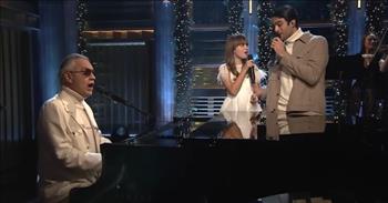 <p>Listen to this wonderful performance by Andrea Bocelli and his children, Matteo and Virginia, as they sing their song &lsquo;The Greatest Gift&rsquo; on Jimmy Fallon.</p>

<p>&ldquo;​​Come and lay your head upon my shoulder, look outside the stars are shining bright<br />
Even though it's turned a little colder, we can light a fire, stay inside<br />
Hear the angels sing, hear the angels sing, Hallelujah from above<br />
Singing peace on earth, there'll be peace on earth<br />
If we open up our hearts and give a little love&rdquo;</p>

<p>What a lovely performance, and it is heartwarming to see Andrea performing with his kids. All three of them are so talented!</p>

<p>The Christmas album that the Bocelli trio recorded together is called A Family Christmas, and it includes this song &lsquo;The Greatest Gift.&rsquo;</p>

<p>Many people shared online about how much they enjoyed this performance of their original song.</p>

<p>&ldquo;Three singing angels! What a beautiful musical family! Love them all!&rdquo; <a href="https://www.youtube.com/watch?v=Jwun-CZC7tg">comments</a> one person after watching the video. &ldquo;Andrea Bocelli has left us the best legacy - his singing children who carry a piece of him in their soul and voices.&rdquo;</p>

<p>&ldquo;Love is truly the greatest gift,&rdquo; another person <a href="https://www.youtube.com/watch?v=Jwun-CZC7tg">writes</a> online. &ldquo;And like the song says, &lsquo;Together take a moment and be grateful for the joy, for the tears.&rsquo; This song is truly beautiful and their voices blend so well together!&rdquo;</p>

<p>The Bocelli family's Christmas album also includes a collection of traditional carols arranged for the three voices. And each member of the Bocelli family gets a chance to shine on A Family Christmas with solo tracks, duets, and trios.</p>

<p>&ldquo;We are offering our small, intimate, and heartfelt gift to anyone who wishes to enjoy the soundtrack of Christmas in the Bocelli home,&rdquo; the family trio <a href="https://www.classicfm.com/artists/andrea-bocelli/christmas-family-trio-feliz-navidad/">say</a> of the album.</p>

<p>And Andrea Bocelli shares about how special it was working on this project with his children. ​​&ldquo;I think there is nothing more beautiful than making music with your kids,&rdquo; he said.</p>

<p>&ldquo;I consider it a privilege,&rdquo; Matteo added. &ldquo;Singing these songs together, feeling the holiday warmth with my family is something really special. That&rsquo;s what Christmas is about &ndash; making memories together to cherish forever. It&rsquo;s really exciting to think that people will have a copy of our album sitting wrapped under the tree.&rdquo;</p>

<p>We hope that you enjoyed listening to this special Christmas performance from the Bocelli family today!</p>
