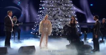 <p>Written in 1945 and first recorded by <a href="https://en.wikipedia.org/wiki/The_Christmas_Song">The Nat King Cole Trio</a> in 1946, &ldquo;The Christmas Song,&rdquo; also known as &ldquo;Chestnuts Roasting on an Open Fire,&rdquo; gets a special rendering when The Voice Judges come together to perform the holiday classic!</p>

<p>While typically competing against one another on their hit television show, the four artists collaborate to bring viewers a special treat for Christmas! John Legend, Camila Cabello, Gwen Stefani, and Blake Shelton make up a dream team with their diverse musical styles and gifts. Watch as they do the perennial favorite proud!</p>

<p>Moving from right to left across the stage, John opens the song with his smooth, cool expression of the lyrics. Camila is a bit dainty and kittenish in her delivery, hitting the high notes with her soprano voice. Gwen sings in a more mature and sophisticated way, and Blake sings in his simple, country manner before offering a &ldquo;simple phrase&rdquo; in unison with his wife at 1:55.</p>

<p>Check out John and Camila as they dance while the pianist and guitarist play solos. The glammed up artists, the silvery flames against the black backdrop, the towering white Christmas tree, and the musical beauty of the singing judges and the instrumentalists convey a mellow, holiday mood. Think hot cocoa, falling snow, and a cozy spot in front of your fire or tree&mdash;or both!</p>

<p>The rotation starts again with John and Camila singing solo before all four sing together the final lines of the song and send out &ldquo;Merry Christmas &ldquo; wishes from them all! It&rsquo;s a lovely performance!&nbsp;</p>

<p>It may have been said many times and in lots of ways, but is there really a bad way to say &ldquo;Merry Christmas&rdquo; to friends, loved ones, co-workers, or strangers on the street? We can&rsquo;t think of any. Though it won&rsquo;t often be done as artistically as the greeting provided by the voices of The Voice, it may be that the only real failing is to fail to say it at all!&nbsp;&nbsp;</p>

<p><em>&ldquo;And if you greet only your own people, what are you doing more than others? Do not even pagans do that?&rdquo; <a href="https://www.godtube.com/bible/matthew/5-47">Matthew 5:47</a></em></p>
