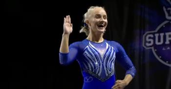 <p>Athletes exemplify a lot of what is best about our society. Athletes must possess a ton of self-discipline, dedication and determination to compete at a high level. One athlete with all three traits is getting a lot of attention for her unique routine.</p>

<p>Gymnasts are exceptional athletes who move and contort their bodies in a variety of astonishing ways. Many can also effortlessly glide through the air with unbelievable elegance and grace. College gymnast Rebekah Ripley displayed all of those and more as she performed a recent floor routine. She did so as if she was the doll Barbie.</p>

<p>Rebekah&rsquo;s routine has been viewed more than <a href="https://www.youtube.com/watch?v=QNv6yerokHM">345,000 times on YouTube</a>!</p>

<p><a href="https://www.youtube.com/watch?v=QNv6yerokHM">In the clip</a>, Rebekah&rsquo;s routine begins as she shifts her arms and legs in a very stiff, unnatural manner. Her movement really does resemble that of Barbie. Also, most of Rebekah&rsquo;s routine is accompanied by, yes, you guessed it: Aqua&rsquo;s 1997 hit &ldquo;Barbie Girl.&rdquo;</p>

<p>About 15 seconds <a href="https://www.youtube.com/watch?v=QNv6yerokHM">in the clip</a>, Rebekah demonstrates her skill and athleticism as she does several backflips consecutively before landing in near-perfect position and form.&nbsp;</p>

<p>Around the <a href="https://www.youtube.com/watch?v=QNv6yerokHM">50-second mark</a>, she hilariously pantomimes a toy being turned off as her arms and head hang down toward the floor. Seconds later, she moves her body in a way that mirrors a toy powered back on.&nbsp;&nbsp;</p>

<p>Rebekah appears to be enjoying herself, acting as one of the most influential and recognizable dolls in history. The commentators make a similar assessment, remarking on Rebekah&rsquo;s apparent joy during her routine.&nbsp;</p>

<p>As inventive as Rebekah&rsquo;s routine is, a statement from one of the commentators makes her performance even more outstanding. He mentions the large, very apparent knee brace on Rebekah&rsquo;s left knee.&nbsp;</p>

<p>&ldquo;Quite a story. You see that knee brace,&rdquo; the commentator says. &ldquo;That&rsquo;s two recoveries from ACL tears.&rdquo;</p>

<p>What an awesome display of strength, athleticism and sheer determination.&nbsp;</p>

<p><em><a href="https://www.godtube.com/bible/1-corinthians/9-24">1 Corinthians 9:24</a> &ldquo;Don&rsquo;t you know that those who run in a race all run, but one receives the prize? Run like that, that you may win.&rdquo;</em></p>
