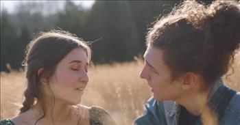 <p>Listen to this stunning version of &lsquo;Can&rsquo;t Help Falling In Love&rsquo; by Jake &amp; Shelby.</p>

<p>&ldquo;Wise men say, &lsquo;only fools rush in&rsquo;<br />
But I can't help falling in love with you<br />
Shall I stay? Would it be a sin<br />
If I can't help falling in love with you?&rdquo;</p>

<p>What a beautiful music video with such lovely singing! Jake &amp; Shelby are such talented musicians, and they sound incredible together. Their harmonies are just wonderful, and listening to them sing together really warms the soul.</p>

<p>In their music video, Jake &amp; Shelby are singing &lsquo;Can&rsquo;t Help Falling In Love&rsquo; in a beautiful field with the breeze blowing all around them. The whole thing is very picturesque.</p>

<p>&ldquo;I can't help loving this breathtaking, tender rendition and I've lost track of the times I've listened to this. Kudos to you both,&rdquo; one person <a href="https://www.youtube.com/watch?v=op_9KnExKJY">writes</a> on YouTube after watching the music video.</p>

<p>&ldquo;Amazing to watch and even better to listen to!&rdquo; <a href="https://www.youtube.com/watch?v=op_9KnExKJY">comments</a> another person online.</p>

<p>According to their YouTube <a href="https://www.youtube.com/@jakeandshelby/about">page</a>, Jake &amp; Shelby are a pop/singer songwriter duo from Nashville, TN. &ldquo;We love to play music together and share what we do with others. Music truly brings people together, and we've seen how it can be there for people in almost any circumstance,&rdquo; they write. &ldquo;Through the songs we write and perform, we want to show others that they are never alone. We also are best friends! So just getting to do anything together outside of music is so much fun!&rdquo;</p>

<p>We hope that you enjoyed listening to this beautiful rendition of &lsquo;Can&rsquo;t Help Falling In Love&rsquo; by Jake &amp; Shelby today! May the music warm your heart and bring a smile to your face.</p>

<p><em><a href="https://www.godtube.com/bible/1-john">1 John 4:7</a><br />
Dear friends, let us love one another, for love comes from God. Everyone who loves has been born of God and knows God.</em></p>
