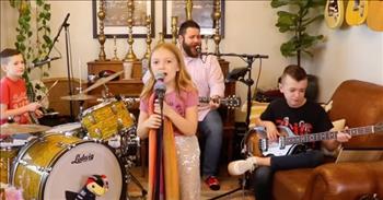 <p>There is plenty of hate, hostility and divisiveness in the world. A quick look at the headlines on the nightly news and the posts on social media prove this to be true. More love and kindness are desperately needed in society today.&nbsp;</p>

<p><a href="https://www.youtube.com/watch?v=YlUGr6gPN3A">The Clark Family Creative</a>, which also encompasses The Quarantine Kids, performs a popular 1970s song about spreading love all across the world: &ldquo;Love Train&rdquo; by The O&rsquo;Jays.&nbsp;</p>

<p>The <a href="https://www.youtube.com/watch?v=YlUGr6gPN3A">cute video begins with</a> family members sitting at various instruments throughout the room. The little girl at the microphone announces the group&rsquo;s upcoming performance of &ldquo;Love Train.&rdquo; Dad, Colt Clark, at the back of the room with the guitar and microphone, counts the little performers down and away they go!&nbsp;</p>

<p>The family is obviously having a ton of fun playing the classic song!&nbsp;</p>

<p>The little girl in the foreground sways back and forth with the rhythm of the music. Colt, in the background, moves his body around with the music as well. It&rsquo;s also clear that the child on the drums, who provides background vocals, and the young man sitting in the chair playing guitar are having a ball. Smiles and laughter abound during the performance!</p>

<p>The catchy and beloved song encourages people to put whatever differences they may have aside and love one another.</p>

<p>&ldquo;People all over the world<br />
Join hands<br />
Start a love train, love train&rdquo;</p>

<p>What <a href="https://www.youtube.com/watch?v=YlUGr6gPN3A">a lovely and fun video</a> of a family simply having a great time playing music together!&nbsp;</p>

<p>The video&rsquo;s description indicates that the entire production really is a family affair. In addition to the three children and dad playing The O&rsquo;Jays hit on camera, mom, Aubree, is the person running the camera.&nbsp;</p>

<p><em><a href="https://www.godtube.com/bible/romans/13-8">Romans 13:8</a> &ldquo;Be in debt for nothing, but to have love for one another: for he who has love for his neighbor has kept all the law.&rdquo;</em></p>
