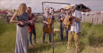 <p>Friendship can and does make a fulfilling life all the richer. Having someone to share a laugh with and be a shoulder to cry upon is invaluable.</p>

<p><a href="https://www.youtube.com/watch?v=aI3xL1GOHRg">The song &ldquo;Ole Montana&rdquo; by The Riverside</a> is a tune about seeking help from a friend while navigating difficult, uncertain periods of life. The song begins with the songwriter detailing how he has gone months without a sign of a friend.</p>

<p><a href="https://www.youtube.com/watch?v=aI3xL1GOHRg">In the first verse, the</a> songwriter is lost in the wilderness, searching for a way through. He&rsquo;s looking for a little help from a friend. At about the 45-second mark in the video, a young woman steps up to the microphone and performs a beautiful violin solo.</p>

<p>Next, after locating a friend after months of searching, the songwriter asks this person a series of questions. They hope they have found someone dependable and who will be there during life&rsquo;s inevitable storms.&nbsp;</p>

<p>&ldquo;And if I&rsquo;m scared, Will I be alone<br />
And if I give up, would you pull me through&rdquo;</p>

<p>In addition to the simple, but effective lyrics about friendship and the difficulties of life, the song&rsquo;s video works in a similar way.&nbsp;</p>

<p>All five musicians stand in a semi-circle formation near a microphone outside in a rolling field. But with the beautiful landscape and the inventive camera angles, the video never does get boring or tedious. Instead, the primary focus remains on the melody and its lyrics. However, thanks to the fields in the background, we are still treated to breathtaking shots of God&rsquo;s wondrous and majestic scenery.&nbsp;</p>

<p>Be sure to check out this awesome, bluegrass-type song from The Riverside.&nbsp;</p>

<p><em><a href="https://www.godtube.com/bible/ecclesiastes/4-9">Ecclesiastes 4:9-10 </a>&ldquo;Two are better than one; because they have a good reward for their labor. For if they fall, the one will lift up his fellow: but woe to him that is alone when he falls; for he has not another to help him up.&rdquo;</em></p>
