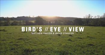 <p>How someone views the world impacts how they react to others and situations.&nbsp;</p>

<p>No matter our point of view or perspective, it is limited. Most people go through life with blinders on, only able to see what is going on in front of them and never getting the entire picture. Matthew Parker and Jacob Stanifer&rsquo;s <a href="https://www.youtube.com/watch?v=Gfx5wgckjyg">song &ldquo;Bird&rsquo;s Eye View&rdquo;</a> is about seeing things differently, asking for a new perspective and another point of view.</p>

<p><a href="https://www.youtube.com/watch?v=Gfx5wgckjyg">In the song's first verse</a>, the singer realizes that he's blinded to things beyond his world and personal experience. He claims that he&rsquo;s been &ldquo;so nearsighted&rdquo; and that there has been &ldquo;so much that I can&rsquo;t see.&rdquo;&nbsp;</p>

<p><a href="https://www.youtube.com/watch?v=Gfx5wgckjyg">To remedy the situation</a>, the singer asks for a different point of view to see things clearer. He is hoping for another way of looking at circumstances to bring much-needed clarity.&nbsp;</p>

<p>The singer, in the song's chorus, makes another, more direct plea. He wants the opportunity to see the bigger picture. He wants the chance to see from a &ldquo;bird&rsquo;s eye view,&rdquo; where he can see everything happening.</p>

<p>&ldquo;I just want to go where<br />
I can see the world so clear<br />
Tell me everything I&rsquo;m missing&rdquo;</p>

<p>The lyrics to <a href="https://www.youtube.com/watch?v=Gfx5wgckjyg">the song&rsquo;s second verse</a> point out that life&rsquo;s storms can and do cause people to lose focus and forget what matters. Specifically, it states that the hailstorm he&rsquo;s in has made him forget why he&rsquo;s fighting.&nbsp;</p>

<p>What an interesting thought and request from the musicians!&nbsp;</p>

<p>How might we react differently to others and situations if we could see the bigger picture? Most people are so concerned with their present situation that they don&rsquo;t stop to think about what they may be missing by not seeing the whole picture. Thankfully, God does have a &ldquo;bird&rsquo;s eye view&rdquo; and can see everything clearly.&nbsp;</p>

<p><em><a href="https://https://www.godtube.com/bible/romans/12-2">Romans 12:2</a> &ldquo;And be not conformed to this world: but be you transformed by the renewing of your mind, that you may prove what is that good, and acceptable, and perfect, will of God.&rdquo;</em></p>
