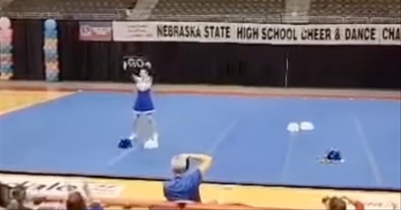 Crowd Supports Cheerleader Performing By Herself After Teammates Quit