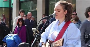 <p>Experience this emotional cover of &ldquo;Tears in Heaven&rdquo; by teen street performer, Allie Sherlock. Hers is a beautiful rendering of a song borne out of grief and loss.</p>

<p>Eric Clapton wrote <a href="https://en.wikipedia.org/wiki/Tears_in_Heaven">the ballad</a> after tragically losing his 4-year-old son, Conor, in March 1991. The song was recorded later that year, released in January 1992, and became Eric Clapton&rsquo;s best-selling single in the United States. And, though the singer, songwriter, and guitarist suffered great pain during that time, <a href="https://www.biography.com/musicians/eric-clapton-tears-in-heaven-son">he attributes the loss</a> to helping him build a closer relationship with his daughter.&nbsp;&nbsp;&nbsp;&nbsp;</p>

<p>Here is the first verse of &ldquo;Tears in Heaven&rdquo;:</p>

<p>Would you know my name if I saw you in heaven?<br />
Would it be the same if I saw you in heaven?<br />
I must be strong and carry on &lsquo;<br />
Cause I know I don't belong Here in heaven</p>

<p>Like Eric Clapton, <a href="https://en.wikipedia.org/wiki/Allie_Sherlock">Allie Sherlock</a> is a singer, songwriter, and guitarist. <a href="https://en.wikipedia.org/wiki/Eric_Clapton">Mr. Clapton</a> was born in Surrey, England. Allie is based in Cork, Ireland, and has become widely recognized by performing in Dublin&rsquo;s streets on the weekends.&nbsp;</p>

<p>One of the most fun things about exploring a large city is seeing all of the interesting performers and acts in the streets! Discovering Allie on a glorious sunny day is clearly a treat for those watching her perform. She sings beautifully and while many keep moving, we see a large audience that stops and savors her song!</p>

<p>Allie&rsquo;s young life hasn&rsquo;t been without trials. Allie left elementary school to be homeschooled after being a victim of bullying. And she lost her mother when she was just 9 years old. So &ldquo;Tears in Heaven&rdquo; may have special meaning for her&mdash;as it does for so many.</p>

<p>Imagine how challenging it must be to sing and play so well with all of the distractions of a busy city street! <a href="https://keyboardkraze.com/what-is-busking/">Busking</a> is tough, but Allie began doing it when she was just 11 years old! Now 17, Allie is now under contract with Patriot Records.&nbsp;</p>

<p>With years of performing experience already, Allie has a bright future! <a href="https://metrobiography.com/allie-sherlock/">Her social media presence </a>is significant. She has 1.9 million followers on Instagram, 26,000 thousand on Twitter, and more than 3.1 followers on Facebook!&nbsp;</p>

<p><em>&ldquo;Laughter can conceal a heavy heart, but when the laughter ends, the grief remains.&rdquo; <a href="https://www.godtube.com/bible/proverbs/14-13">Proverbs 14:13</a></em></p>
