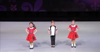 <p>If you are looking to smile and laugh with happiness, this video is for you. A boy and two girls come out onto a stage and wow the crowd. This adorable trio of tots dance to Elvis Presley&rsquo;s &ldquo;Hound Dog.&rdquo;&nbsp;</p>

<p>At the start of the video, the announcer welcomes three precious toddlers. The boy is dressed up in black, and the girls in red poodle skirts. They move like a dog and dance in unison. Suddenly the boy runs forward and leans over to show off his amazing headstand as the girls do a cute dance behind him. The boy proves to hold his impressive move for a good while.&nbsp;</p>

<p>As they do the motions of a hound dog and cry, they own the stage. The incredible moves include touching their head with their feet, back walkovers, and round-offs. The choreography is adorable, and the three kids finish the performance strong. The audience cheers with delight. The smiles on the little performers&#39; faces say it all as the trio exits the stage.</p>

<p>As we watch this video, it is inspiring to witness such young people with such confidence in front of a crowd. Each brings a unique ability and personality. The girls with their swinging side ponytails have charm and spunk, and the boy with his suave hair has excitement and flare.&nbsp;</p>

<p>When we see such incredible skills at such young ages, it reminds us that the Lord is the one who blesses us with talents. There is only so much you can teach a preschooler, the rest is raw talent. These kids have both! Their teacher and parents must be completely proud of them.&nbsp;</p>

<p><em>God has given each of us skills, and no matter what age, we are invited to use them for His glory. &ldquo;In his grace, God has given us different gifts for doing certain things well.&rdquo; <a href="https://www.godtube.com/bible/Romans/12-6">Romans 12:6a</a></em></p>

