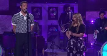 <p>We hope this clip brightens your day with Kelly Clarkson and Zachary Levi performing the cover of Frank Sinatra&rsquo;s classic, &lsquo;Something Stupid.&rsquo;&nbsp;</p>

<p>Kelly is well known for performing on her show with some of the greatest singers of all time, like Garth Brooks and Carrie Underwood. She brought on guest star Zachery Levi on her talk show and their voices blended together perfectly like Nancy and Frank Sinatra.&nbsp;</p>

<p>Their voices sounded tender and romantic during their spectacular performance of this slow-tempo song. As they stood in moody purple lighting, they sang,&nbsp; &ldquo;I know I stand in line until you think you have the time to spend an evening with me, and if we go someplace to dance, I know that there's a chance you won't be leaving with me,&rdquo; they gently crooned in perfect unison. &ldquo;Then afterward, we drop into a quiet little place and have a drink or two,&rdquo; they harmonized.&nbsp;</p>

<p>&ldquo;And then I go and spoil it all by saying something stupid like I love you,&rdquo; they sang the song&rsquo;s signature lyrics tenderness. The song began to pick up the beat&nbsp; when Kelly and Zachary sang, &ldquo;I can see it in your eyes you still despise the same old lines you heard the night before, and though it's just a line to you, for me it's true and never seemed so right before.&rdquo;&nbsp;</p>

<p>Then Kelly used her incredible voice to climb higher octaves. &ldquo;I practice every day to find some clever lines to say to make the meaning come true, but then I think I'll wait until the evening gets late and I'm alone with you,&rdquo; they sang, using heavenly notes. When they came to the end of their performance, the pair received thunderous applause from the audience as they gave each other a high five and then a hug.&nbsp;</p>

<p>Thank God for the gift of music and for Kelly Clarkson and Zachary Levi. Their performance was stunning and beautiful despite the cheeky lyrics. We hope this duo performance was a treat!&nbsp;</p>
