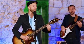 <p>A group of musicians performed a beloved hymn in two different languages at a special location in the Middle East.</p>

<p>Hymns are beautiful pieces of music that have been played in churches for decades. Their powerful lyrics and messages are immediately evident from their opening verses. Those choruses are memorable and get stuck in the head, lasting for several days. Hymns such as &ldquo;Amazing Grace,&rdquo; &ldquo;Great is Thy Faithfulness&rdquo; and &ldquo;How Great Thou Art&rdquo; have the unique ability to move even the most stoic person to tears.</p>

<p>In a <a href="https://www.youtube.com/watch?v=jWcR_ocNlks">video posted to YouTube</a>, Joshua Aaron and the musicians backing him up performed the classic hymn &ldquo;Because He Lives&rdquo; at the Garden Tomb in Jerusalem. However, this performance is made even more special not just due to the musicians&rsquo; location. Joshua also performs the song in Hebrew.</p>

<p>The small crowd who has gathered to take in the dazzling performance loves what they're hearing. Many sing along, mouthing the words as Joshua beautifully belts out the lyrics. Several of them even hold out their hands and arms in praise and reverence.</p>

<p>&ldquo;Because He lives all fear is gone<br />
Because I know He holds the future<br />
And life is worth the living just because He lives&rdquo;</p>

<p>Praise God. He does live! The stone has been moved and rolled away.&nbsp;&nbsp;</p>

<p>After first singing the song in English, Joshua ends the video by singing &ldquo;Because He Lives&rdquo; in Hebrew. While many English speakers may not understand that language, Hebrew is still a beautiful language to hear.&nbsp;</p>

<p>At the end of the musicians&rsquo; performance, the crowd peering on shows their appreciation by giving them a hearty round of applause.&nbsp;</p>

<p><em><a href="https://www.godtube.com/bible/1-peter/1-3">1 Peter 1:3</a> &ldquo;Blessed be the God and Father of our Lord Jesus Christ, who according to his great mercy begat us again until a living hope by the resurrection of Jesus Christ from the dead.&rdquo;</em></p>
