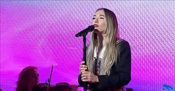 <p>It is always refreshing when Christian music gets highlighted on national television. In this video clip, Lauren Daigle performs, &ldquo;Thank God I Do&rdquo; on <em>Good Morning America</em>.</p>

<p>We see Lauren Daigle waving at the camera in an incredible outfit with her bright smile. She is on the City Music Series to reveal her new music. She is a grammy winner and has over a billion downloads.&nbsp;</p>

<p>They begin to ask her about the new album. She shares how this album was songs that she personally needed right out of COVID and it was cathartic. She desired to seek healing through creativity.&nbsp;</p>

<p>One host shared that Lauren was supposed to have a concert in Nashville on the day of the school shooting and immediately did a prayer vigil instead. Lauren says that if there is &ldquo;one shred of hope she could give, then that would be a gift.&rdquo; Lauren reveals that she needed to find her voice again in a time of difficulty.</p>

<p>The piano begins, and Lauren&rsquo;s vulnerable and authentic lyrics speak to so many of fighting fears and darkness. Here lyrics powerfully proclaim:</p>

<p>&ldquo;I don't know who I'd be if I didn't know You<br />
I'd probably fall off the edge<br />
I don't know where I'd go if You ever let go<br />
So keep me held in Your hands&rdquo;&nbsp;</p>

<p>Lauren&rsquo;s proclamation is that God gives her the identity she needs not to go over the edge. Her voice is powerful and confident.&nbsp;</p>

<p>We have such peace and joy listening and reflecting on this message that Jesus is our hope and that we wouldn&rsquo;t have direction in the hard times without Him. He is good.</p>

<p><em>&ldquo;Before I formed you in the womb I knew you, before you were born I set you apart; I appointed you as a prophet to the nations.&rdquo; <a href="https://www.godtube.com/bible/Jeremiah/1-5">Jeremiah 1:5</a></em></p>
