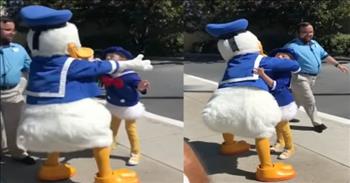 <p>One child with a disability had a sweet encounter with his favorite animated character.</p>

<p>Over the years, Disney has created dozens of beloved films and characters that hold a special place in the hearts of many. Disney&rsquo;s beloved theme parks all over the world provide visitors with the unique opportunity to meet those historic characters.&nbsp;</p>

<p>In Central Florida, Disney has four iconic theme parks &ndash; Magic Kingdom, EPCOT, Hollywood Studios and Animal Kingdom. It was at Hollywood Studios where one special and heartwarming moment took place.</p>

<p>AAsher Lilles is a young man who suffers from Down syndrome and also has non-verbal apraxia, <a href="https://6abc.com/society/boy-with-down-syndrome-shares-sweet-moment-with-donald-duck/5342089/">according to ABC6</a>. AAsher also happens to love Donald Duck and during a trip to Hollywood Studios, he got to meet the cartoon duck.</p>

<p>In the <a href="https://www.youtube.com/watch?v=nNYE87EDIRI">clip posted on YouTube</a>, AAsher, who is dressed just like his favorite cartoon character, stands and waits behind a park employee. Seconds into the video, Donald runs up to the little guy with his arms wide open.</p>

<p>But instead of a hug, Donald spins around frantically several times before finally giving the young man a loving embrace. Donald then positions AAsher in order to get a good look at his outfit, which is the exact same one the duck is wearing.&nbsp;</p>

<p>Before the clip ends, Donald and AAsher shake their behinds together at the camera.</p>

<p>At Disney&rsquo;s many theme parks around the world, dreams really do come true every day. Families use valuable vacation time to visit those parks because they know they&rsquo;ll make cherished memories that will last a lifetime.</p>

<p>AAsher&rsquo;s precious and heartwarming encounter with Donald Duck is likely something he and his family will remember forever. A little bit of kindness can make someone&rsquo;s entire day, which the video perfectly illustrates.</p>

<p><em><a href="https://www.godtube.com/bible/colossians/3-12">Colossians 3:12</a> &ldquo;Put on therefore, as the elect of God, holy and beloved, a heart of compassion, kindness, humility, meekness, longsuffering.&rdquo;</em></p>
