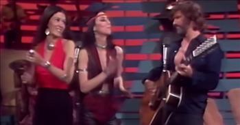 <p>Three legendary entertainers joined forces for a powerhouse performance medley of country music songs.&nbsp;</p>

<p>Country music, like every other genre, has devoted, die-hard fans. But as anyone even remotely familiar with country music will admit, not all country music is created equal. A lot of what is considered country music today is basically pop music with a Southern accent. That sound probably won't appeal to people who prefer Johnny Cash, Merle Haggard or Waylon Jennings.</p>

<p>Those who prefer their country music to be more of the old-school variety are in luck!</p>

<p>In a <a href="https://www.youtube.com/watch?v=7Bkx8p_j9ZM">video posted to YouTube</a>, Cher, Rita Coolidge and Kris Kristofferson combined their massive musical talents during an episode of The Cher show in 1975 for a country music performance.</p>

<p>The trio first sings Don Gibson&rsquo;s &ldquo;Oh, Lonesome Me.&rdquo; Next, they move on to &ldquo;Help Me Make It Through the Night&rdquo; and end by singing Merle Haggard&rsquo;s &ldquo;Okie from Muskogee.&rdquo;</p>

<p>All three of the legendary performers sound terrific! Throughout the nearly 5-and-a-half-minute clip, Rita, Cher and Kris all have several opportunities in which their considerable talents shine. All three share the singing duties while Kris also strums along on the guitar.&nbsp;</p>

<p>The performers allow their immense musical abilities to be the focus of their performance. None of them employ overused theatrical tricks like crazy, over-the-top outfits or hairdos or annoying and bothersome lighting. Instead, the music is their biggest concern, which is how it should be.&nbsp;</p>

<p>At the end of the clip, the studio audience erupts in thunderous applause as they show the trio their appreciation.&nbsp;</p>

<p>Several who commented on the video mentioned how much they loved the performance.</p>

<p>&ldquo;Stupendous as per usual! Cher is just a special type of genius performer, even among other great performers,&rdquo; one person wrote.</p>

<p>&ldquo;Wow!!! What an amazing blast from the past &ndash; I LOVE THIS!!!! Three great artists and three great songs and Cher&rsquo;s voice is so powerful as usual!!!! Listening to Cher sing is like a breath of fresh air,&rdquo; a second user added.&nbsp;</p>

<p><em><a href="https://www.godtube.com/bible/ephesians/5-19">Ephesians 5:19</a> &ldquo;Speaking to yourselves in psalms and hymns and spiritual songs, singing and making melody in your heart to the Lord.&rdquo;</em></p>
