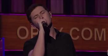 <p>Check out this wonderful rendition of the song &lsquo;Hello Darlin&rsquo; from Scotty McCreery at The Grand Ole Opry.</p>

<p>&ldquo;Hello darlin', nice to see you, it's been a long time, you're just as lovely as you used to be<br />
How's your new love, are you happy, hope you&rsquo;re doin' fine, just to know it<br />
Means so much to me, what's that darlin', how am I doin', I'm doin' alright except I can't sleep<br />
And I cry all night 'til dawn, what I'm trying to say is I love you and I miss you&rdquo;</p>

<p>The song &lsquo;Hello Darlin&rsquo; was written by Conway Twitty, and it was his first single and title track for the album of the same name. It was released in March 1970 and became Conway Twitty&lsquo;s fourth #1 hit on the US Billboard Hot Country Singles chart.&nbsp;</p>

<p>&lsquo;Hello Darlin&rsquo; spent a total of four weeks at number one on the charts and was also named as the number one song of 1970. The song was also nominated for Country Music Association Award for Song of the Year and Country Music Association Award for Single of the Year. In 1999, &lsquo;Hello Darlin&rsquo; was added to the Grammy Hall of Fame, and its years of popularity made it an iconic country classic.</p>

<p>In this video, Scotty McCreery did such an incredible job with his rendition of &lsquo;Hello Darlin&rsquo;, and his smooth voice definitely did the country classic justice. Many people online thought the same.</p>

<p>&ldquo;Out of this world!&rdquo; <a href="https://www.youtube.com/watch?v=w0GEpAJ7H5Y">comments</a> one person after watching the music video on YouTube. &ldquo;There will never be another Conway, but this talented young man nailed it! The best rendition I have ever heard.&rdquo;</p>

<p>&ldquo;Not many people can do Conway justice, but this is amazing!&rdquo; <a href="https://www.youtube.com/watch?v=w0GEpAJ7H5Y">writes</a> another person online.</p>

<p>We hope that you enjoyed listening to Scotty McCreery sing &lsquo;Hello Darlin&rsquo; at The Grand Ole Opry today.</p>
