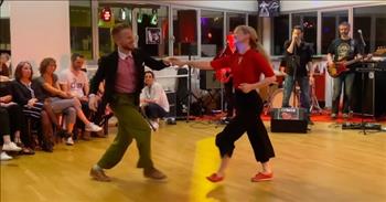 <p>Two gifted dancers showed their impressive moves during a wholly improvised dance number.</p>

<p>Dance, like anything else, takes hours and hours of dedicated practice to appear even slightly competent at it. Sure, anyone can go out on the dance floor and try a move. But the odds of looking like a complete and total amateur who has no idea what they are doing are fairly high, almost a certainty.</p>

<p>A <a href="https://www.youtube.com/watch?v=0J7ke5Pt8po">video posted to YouTube</a> shows two people who are anything but amateurs. In the clip, Sondre and Tanya, a &ldquo;professional swing dance couple,&rdquo; took to the floor and in an improvised boogie woogie dance, wowed an adoring crowd.</p>

<p>In the nearly 5-minute clip, the two talented dancers strut their stuff, moving rhythmically along to the music being sung and played by the band. Their moves are so in sync that they appear to glide across the dance floor as one.&nbsp;</p>

<p>While the young man in the video obviously has a plethora of moves and tons of talent, it&rsquo;s his female partner who steals the show. She moves rhythmically with relative ease, making it appear easy. Of course, anyone knows that is not the case at all.</p>

<p>At approximately the 24-second mark of the clip, the woman employs one of Michael Jackson&rsquo;s patented dance moves &ndash; the Moonwalk. For a few seconds, she does actually look to be moving backward on a moving walkway.&nbsp;</p>

<p>If that wasn&rsquo;t impressive enough, the couple uses acrobatic moves in their dance number. After picking up his female partner, the man throws her toward the ground, sending her through his legs and sliding onto the floor. They use another acrobatic move to finish off their dance. The man flips the woman, head over heels, over his shoulder.&nbsp;</p>

<p>The entire clip is a sight to behold for those who enjoy dance and for anyone who can&rsquo;t even take a step without twisting an ankle.&nbsp;</p>

<p><em><a href="https://www.godtube.com/bible/psalms/149-3">Psalm 149:3</a> &ldquo;Let them praise his name in dance: let them sing praises to him with the tambourine and harp.&rdquo;</em></p>
