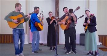 <p>A group of skilled folk and bluegrass musicians gave a stirring rendition of a song about the eternal home for the believers and followers of Christ.</p>

<p>No one can be sure what will happen from one minute to the next. No one will get a second more or less than their allotted time. Everyone has a limited, specified amount of time on Earth, which is only a temporary place.&nbsp;</p>

<p>For those who believe in and follow the words and teaching of Jesus Christ, something much better than this Earth awaits. Those who have accepted Christ as their personal Lord and Savior will live with Him in heaven once this life is complete. In a <a href="https://www.youtube.com/watch?v=3VJongfNBoM">clip posted on YouTube</a>, the Brandenberger Family sings and plays a beautiful hymn about crossing over and living in the glory land, &ldquo;Over in the Glory Land.&rdquo;</p>

<p>As the clip shows, six musicians playing various instruments, while standing on a platform in what appears to be a small church. A large cross is on the wall behind the musicians throughout the video.</p>

<p>The lyrics in the song&rsquo;s opening verse make it abundantly clear where the songwriter and the musicians intend to be once their time on Earth has come to an end. The musicians have confidence that they will be with the Lord in heaven.</p>

<p>&ldquo;I&rsquo;ve a home prepared where the saints abide<br />
Over in the glory land<br />
I long to be by my Savior&rsquo;s side<br />
Over in the glory land&rdquo;</p>

<p>Later in the song, the musicians mention other aspects of heaven, what they expect once they arrive at their eternal home. They sing that they will join the angels. Also, they are looking forward to their mansion in heaven. But most of all, they cannot wait to finally see the Lord and spend time with Him in heaven. What a wonderful and joyful thought, they sing.&nbsp;</p>

<p>It&rsquo;s unclear exactly how much time we have left on Earth. No one knows or can know. But because of Jesus Christ and His death on the cross, we have a chance at everlasting life with Him.</p>

<p><em><a href="https://www.godtube.com/bible/john/14-2">John 14:2</a> &ldquo;In my Father&rsquo;s house are rooms enough; if it was not so, would I have said that I am going to make ready a place for you?&rdquo;</em></p>
