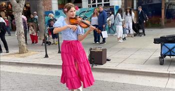 <p>One young woman, Karolina Protensko, gave a stunning performance of &ldquo;Flowers,&rdquo; a hit song by Miley Cyrus.</p>

<p>The ability to sing and play instruments, creating beautiful music, is one of the many blessings and gifts God bestows upon people. Those people, when they put those musical gifts to work and play for others to hear, use those talents as God intended. Music is one of life&rsquo;s many blessings.&nbsp;</p>

<p>Karolina shared her musical gifts and expertise on the violin for many to hear in a <a href="https://www.youtube.com/watch?v=a2T9k9O92rA">video posted on YouTube</a>. She puts on a free concert in what appears to be a shopping district filled with tourists.</p>

<p>The clip begins right after Karolina just finished another song. She takes a bow as the crowd watching the performance gives her a nice round of applause. However, seconds later, the young woman is off and quickly begins playing another tune: &ldquo;Flowers&rdquo; by Miley Cyrus.</p>

<p>Anyone familiar with the song will immediately recognize the tune from Karolina&rsquo;s expert playing on the violin. As she plays, she dances around and smiles and does so all throughout the performance. It&rsquo;s clear to anyone watching that Karolina is amazingly gifted with the stringed instrument and thoroughly enjoys playing.</p>

<p>But as the video perfectly illustrates, she is not the only one who enjoys the beautiful sounds emanating from the violin. Many people have formed a circle around Karolina as they stand and take in the free concert.</p>

<p>At the 38-second mark of the clip, one man even begins strutting his stuff, showing off his best moves while Karolina plays the instrument. Then around 1 minute and 30 seconds into the video, two other people are so moved by the music that they also start grooving along to the beat.</p>

<p>The crowd gives the young woman a well-deserved round of applause for her inspired and breathtaking instrumental cover of the hit from Miley Cyrus.&nbsp;</p>

<p><em><a href="https://www.godtube.com/bible/psalms/95-1">Psalm 95:1</a> &ldquo;O come, let us make songs to the Lord; sending up glad voices to the Rock of our salvation.&rdquo;</em></p>
