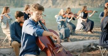 <p>A group of musically gifted high school students displayed their tremendous talents while singing about the power and magnitude of God.</p>

<p>Christians serve a wonderful and loving God. He sent His one and only son to die a painful and undeserving death on behalf of mankind. Christ&rsquo;s spilled blood on the cross covers all sin and shame, blotting it out as if it never existed. What an enormous and world-changing show of grace, mercy and power!</p>

<p>An awe-inspiring<a href="https://www.youtube.com/watch?v=R5iAy7FQuNo"> video posted on YouTube</a> shows students from Fountainview Academy, a Christian high school in Canada, belting out the lyrics to &ldquo;Behold Our God.&rdquo;&nbsp;</p>

<p>As one young man sings the tune&rsquo;s first verse, he perfectly puts the power of God into perspective. God&rsquo;s strength, power and capability are hard to grasp with the human mind. The human mind is limited, but God&rsquo;s power knows no restriction.</p>

<p>&ldquo;Who has held the oceans in His hands?<br />
Who has numbered every grain of sand?<br />
Kings and nations tremble at His voice<br />
All creation rises to rejoice&rdquo;</p>

<p>A young woman next walks into the frame and beautifully sings the song&rsquo;s second verse. During this verse, the camera reveals other high school students playing various instruments.&nbsp;</p>

<p>At around the 1:45-minute mark of the clip, dozens of students join in, singing out the lyrics about God&rsquo;s almighty and mind-blowing power as they walk through an idyllic forest. The gifted students blend their voices together, hitting all the right notes.&nbsp;</p>

<p>In addition to the students&rsquo; breathtaking musical performances, the video is also a sight to be seen. The short, 4-and-a-half-minute clip is wonderfully shot and edited together. Throughout the video, there are wide sweeping shots of the stunning scenery. The masterful camera work helps to enhance the song&rsquo;s lyrics by showing the beauty of God&rsquo;s creation.</p>

<p>Fountainview Academy is an educational institution for high school students in Columbia, Canada.&nbsp; It&rsquo;s a place where &ldquo;each staff member is personally committed to the eternal success of every student,&rdquo; according to its <a href="https://www.youtube.com/@fountainviewacademy/about">YouTube channel</a>.</p>

<p><a href="https://www.godtube.com/bible/joshua/1-9">Joshua 1:9 </a>&ldquo;Have I not given you your orders? Take heart and be strong; have no fear and do not be troubled; for the Lord your God is with you wherever you go.&rdquo;</p>
