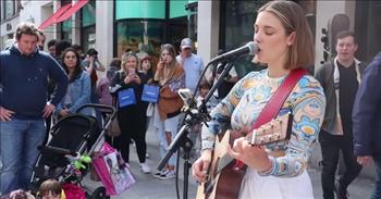 <p>One young woman&rsquo;s beautiful rendition of a classic song from the 1960s had her massive audience in awe.</p>

<p>Covering songs from other artists is a fantastic way for up-and-coming musicians to get attention. By singing songs a majority of the population already knows, people are more likely to stop and at least give a musician&rsquo;s performance a few moments of their time. But even then, the musician likely only has seconds to convince an audience member of their talent and skill.</p>

<p>In a <a href="https://www.youtube.com/watch?v=Lmf_qPS6XMQ">clip posted on YouTube</a>, Allie Sherlock performed The Righteous Brothers&rsquo; beloved song &ldquo;Unchained Melody&rdquo; on the streets of Dublin. As the video shows, her beautiful voice and strumming on the guitar won her quite the audience as she performed the familiar song.</p>

<p>Allie, simply by using her voice, gives the song a completely different sound from the original. She has a distinct Irish, folky sound, which works perfectly, making the Righteous Brothers&rsquo; song her own.&nbsp;</p>

<p>Then around the 1-minute mark in the clip, the young woman shows off the strength of her voice. She reaches back and unexpectedly hits and holds high notes.&nbsp;</p>

<p>As mentioned, Allie&rsquo;s performance won her a massive crowd. In the early portions of the clip, as Allie is playing, several people can be seen walking behind her. A handful of people completely stop, take in the young woman&rsquo;s performance and then move along. But then, around the 1:30 minute mark, the camera swings around and shows how many people are watching the free concert.</p>

<p>The street in front of Allie is packed with people either sitting or standing, crowding around, taking in the beautiful sounds coming from the talented performer. Her crowd size is surprising but not surprising at the same time.</p>

<p>Normally, not many people stop everything they are doing and take in someone playing on the street. But when they sound like Allie, it makes perfect sense why someone would do so.&nbsp;</p>

<p><em><a href="https://www.godtube.com/bible/ephesians/5-19">Ephesians 5:19</a> &ldquo;Speaking to yourselves in psalms and hymns and spiritual songs, singing and making melody in your heart to the Lord.&rdquo;</em></p>
