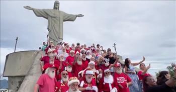 <p>Before the calendar even flipped to July, a group of about 50 Santas headed to <a href="https://www.worldatlas.com/landmarks/christ-the-redeemer-brazil.html">Christ the Redeemer</a> statue to plea for peace, bringing a little Christmas cheer with them!</p>

<p>One of the <a href="https://en.wikipedia.org/wiki/New_7_Wonders_of_the_World">New Seven Wonders of the World</a>, Christ the Redeemer was completed and inaugurated in 1931 and turned 75 in 2006. Located in Rio de Janeiro, Brazil, the Art Deco statue&nbsp; stands 98 feet tall, has a width of 92 feet, weighs 635 tons, and is the reason <a href="https://www.fodors.com/world/south-america/brazil/experiences/news/everything-you-need-to-know-before-visiting-brazils-christ-the-redeemer">two million visitors</a> come to the city every year!&nbsp;&nbsp;&nbsp;</p>

<p>Back in June, a crew of Kris Kringles from around the world gathered on the steps at the base of the statue, sang Christmas songs, and petitioned those there in person and online to work toward peace. The Santas were dressed in full costumes specific to their countries of origin or simply donned white beards and festive t-shirts. They traveled to the city for <a href="https://english.news.cn/20230619/11d701c12c844658abb61fbbf5ba7755/c.html">Brazil&rsquo;s 4th Santa Clause National Encounter</a>. They posed for pictures with tourists and probably took a few requests from kiddos during the event.&nbsp;</p>

<p>In the spirit (pun intended) of much smaller figurines of Santa kneeling in front of Baby Jesus as He lies in the manger, the Santas appearance here demonstrates humility and reverence for the one who makes miracles happen throughout the year&mdash;rather than just during a particular holiday season.&nbsp;&nbsp;&nbsp;</p>

<p>Inside Edition Digital&rsquo;s reporter Stephanie Officer spoke with a French guest named Margo. Margo appreciates the Santas&rsquo; timeless message and the symbolism of sharing their message from Christ the Redeemer. What a treat it must have been for vacationers to have gotten to visit with Santa during their visit to the iconic statue.&nbsp;&nbsp;&nbsp;</p>

<p>The Santas smile and wave, happy to be doing what they do, but in awe of Him who is more wondrous than any statue and brings more magic than they ever will.&nbsp;</p>

<p>Nicely done, Santas! Now head back north and get back to business. Christmas is coming!</p>

<p><em>&ldquo;Praise be to the God and Father of our Lord Jesus Christ! In his great mercy he has given us new birth into a living hope through the resurrection of Jesus Christ from the dead,&rdquo; <a href="http://https://www.godtube.com/bible/1-peter/1-3">1 Peter 1:3</a></em></p>
