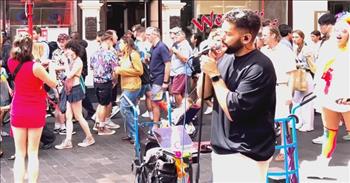 <p>A man singing Calum Scott&rsquo;s hit, &ldquo;Dancing on My Own,&rdquo; on the streets of London got some unexpected help during his performance.</p>

<p>Entertainment is a tough field to break into and make a steady, comfortable living. Many people dream of becoming an actor and appearing on television and the big screen. Others want to put their musical talents on full display as they perform on stage in front of thousands of adoring fans every night.&nbsp;</p>

<p>But those are tasks easier said than done. Aspiring musicians must use whatever venue available to them to show off their talent, hoping to win over fans and gain attention.&nbsp;</p>

<p>In a <a href="https://www.youtube.com/watch?v=5zXItcSw6qw">video posted on YouTube</a>, one man, Luke Silva, took to the busy streets of London where he beautifully performed Calum Scott&rsquo;s &ldquo;Dancing on My Own.&rdquo;&nbsp;</p>

<p>As the video shows, hundreds of people walk by as he belts out the lyrics. But early in his performance, a young woman joins in and begins dancing along with his singing. She does a series of interpretative dance moves along to Luke&rsquo;s marvelous singing.</p>

<p>She uses the entire space around the musician to perform her dance. Eventually, she moves to the area in front of Luke. As the camera swings around and captures her routine, it reveals the massive crowd taking in the extraordinary and spontaneous street performance.</p>

<p>However, she doesn&rsquo;t stick around throughout the entire song. Luke encourages the crowd to show the young woman some appreciation. At around the 2:30-minute mark of the clip, she stops dancing and eventually walks off.&nbsp;</p>

<p>But the young woman in the red dress apparently inspired someone else to strut their stuff as Luke sings. Before the end of the clip, a little girl tries out a few dance moves of her own that are similar to those of the woman in the red dress.</p>

<p><em><a href="https://www.godtube.com/bible/psalms/30-11">Psalm 30:11</a> &ldquo;You have turned for me my mourning into dancing: you have put off my sackcloth, and girded me with gladness;&rdquo;</em></p>
