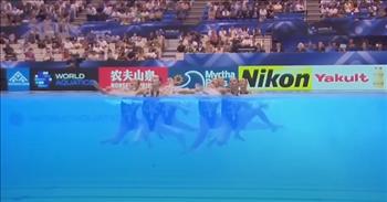 <p>A group of athletically gifted women competing on the world stage captured a bronze medal with their stunning routine.</p>

<p>To be an athlete competing at the highest level possible requires massive amounts of determination and dedication. Athletes put in hours and hours of meticulous and intense practice working on their craft, going over and fine-tuning every detail. Most put their blood, sweat and tears into reaching their goal.</p>

<p>A <a href="https://www.youtube.com/watch?v=hSEy7ee0MiQ">clip posted on YouTube</a> shows a group of female athletes reacting during the moment when all their hard work, dogged practice and extreme dedication paid off in a big way.</p>

<p>In the video, Team USA prepares to enter the pool during the World Aquatics Championships in Fukuoka, Japan. The women are competing in the artistic swimming event.</p>

<p>As the commentators point out, there was a lot riding on this routine from the United States. Spain and Italy had already secured their medals. Whether the USA would qualify for a medal or not rested on their competency in their upcoming routine.&nbsp;</p>

<p>However, before they enter the swimming pool, a memorable and classic song starts, Michael Jackson&rsquo;s &ldquo;Smooth Criminal.&rdquo; Once they enter the pool, the athletes come together in a big way, stunning one of the commentators right from the get-go.</p>

<p>In the opening seconds of the routine, the group of women lifts one member several feet up out of the pool.</p>

<p>&ldquo;Such high risk,&rdquo; one commentator states. &ldquo;Incredible balance.&rdquo;</p>

<p>From that point forward, the women, in complete synchronicity, pull off what is essentially a dance number while underwater. There is even a point when the women are upside down, with their feet and legs sticking out of the water. Their movements are timed perfectly. No one ever misses a step.&nbsp;</p>

<p>After pulling off their intense and demanding routine, the women must sit and wait for a minute or two. But when their final scores are revealed, which results in a bronze medal, it is pure joy and happiness!</p>

<p><em><a href="https://www.godtube.com/bible/1-corinthians/9-24">1 Corinthians 9:24</a> &ldquo;Do you not see that in a running competition, all take part, but only one gets the reward? So let your minds be fixed on the reward.&rdquo;</em></p>
