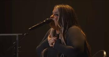 <p>Listen to this beautiful performance from Anna Golden with Aodhan King of the song &lsquo;Because Of You.&rsquo;</p>

<p>&ldquo;From the moment I rise til I lay my head, You are on my mind, You are the best part<br />
Of every breath, I will spend my life talking about Your faithfulness, because of You<br />
I see a new horizon. Because of You all my fears go quiet, I know You hold the whole world<br />
In Your hands, and this life is worthwhile all because of You. You&rsquo;re the color in every sunrise&rdquo;</p>

<p>The song &lsquo;Because Of You&rsquo; is the second single from Anna Golden&rsquo;s new live album titled Church, which is coming out this month. The record has 11 tracks on it, and the songs give a testimony to the power of faith and how Anna Golden refuses to let painful experiences define her life.&nbsp;</p>

<p>In this song, she is joined by Hillsong Worship's Aodhan King. And the lyrics in &lsquo;Because Of You&rsquo; encourage listeners who are hurting to reframe their perspective on life, let go of their fears, and find joy in the small things.</p>

<p>&ldquo;&lsquo;Because Of You' is a song written about how beautiful a life with Jesus is. A love song that captures just how stunning your every day is because of the faithfulness, kindness, and consistency of who He is. A reminder that even though life holds such uncertainty, He still gives us hope for a new horizon and peace in the midst of chaos," Anna Golden <a href="https://www.christianpost.com/news/singer-anna-golden-bears-heart-in-new-single-because-of-you.html">shared</a>. "This song pulls inspiration from the old hymn 'Because He Lives,' a modern take on the beautiful message, 'Life is worth the living, just because He lives.&rsquo;&rdquo;&nbsp;</p>

<p>We hope that you enjoyed listening to &lsquo;Because Of You&rsquo; from Anna Golden and featuring Aodhan King today! And may it remind you of the beauty of life with Jesus by your side.</p>
