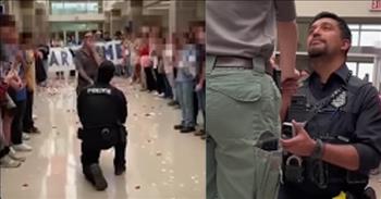 <p>Several students lent a helping hand, assisting a school resource officer with his touching and heartwarming marriage proposal.</p>

<p>All the events leading up to and surrounding a wedding ceremony are opportunities to create lifelong, cherished memories. From the reception, honeymoon and wedding, those moments will be remembered and looked back upon fondly forever. But the one event that sets everything else in motion is the proposal.</p>

<p>For one couple, their proposal is a story both will enjoy retelling for years. A <a href="https://www.youtube.com/shorts/_1u86_glUtM">clip posted on YouTube</a> shows that a group of students helped a school resource officer with a dazzling and sweet proposal to the love of his life.&nbsp;</p>

<p>The short video begins by explaining the situation and the students&rsquo; role in a marriage proposal. The kids got things started by reaching out to animal control, who then sent over a woman to handle the reported situation.</p>

<p>However, as the video shows, she was quickly left dumbfounded, realizing this is not like any on-the-job situation she has encountered. The woman from Animal Control walks down the school hallway as all the students split, moving to either side of the room.</p>

<p>As the woman walks down the hallway, she sees a banner held by other students on the far end of the room. The large decoration has a straightforward message. Once she sees the message, she stops and turns slightly, looking behind her for answers.&nbsp;</p>

<p>She is obviously confused by the circumstances. But then it all starts to make sense.</p>

<p>The school resource officer walks into the frame and quickly gets down on one knee.</p>

<p>&ldquo;I love you, and I want to spend the rest of my life with you,&rdquo; the man tells the woman. &ldquo;Will you marry me?&rdquo;</p>

<p>&nbsp;There is no hesitation from the young woman.&nbsp;</p>

<p>&ldquo;Of course,&rdquo; she answers.</p>

<p>The newly engaged couple hugs as the students burst into cheers and applause.</p>

<p><em><a href="https://www.godtube.com/bible/genesis/2-24">Genesis 2:24 </a>&ldquo;Therefore shall a man leave his father and his mother, and shall join to his wife: and they shall be one flesh.&rdquo;</em></p>
