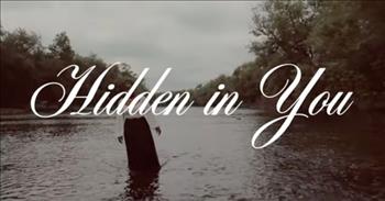 <p>Does it feel like the ground beneath your feet feels like shifting sand that swirls with the ocean tide? Is your heart filled with doubt, fear, and anxiety? Let the song, &lsquo;Hidden In You&rsquo; by Naomie in her official lyric video wash away your fears and saturate you in the presence of the Lord.&nbsp;</p>

<p>Naomie walks through a lush forest to the edge of a flowing river where she slowly wades into the water as she sings of God&rsquo;s perfect peace and how His goodness will overcome the world. Her melodic voice ushers us to remember God&rsquo;s promises.&nbsp;</p>

<p>You are the perfect peace Coming to rescue me<br />
&lsquo;Cause my life is hidden, hidden in you<br />
You are the constant one Your goodness will overcome<br />
&lsquo;Cause my life is hidden, hidden in you</p>

<p>To be hidden in Christ doesn&rsquo;t mean we are waiting for eternity. It means to be hidden in God here and now. When Jesus died, He didn&rsquo;t die for Himself; He died in place of us, taking our sins upon Himself. When we said yes to Jesus, we passed through death and are now in Christ. This monumental truth means we will have all of eternity to be with the Lord. In the here and now, we will go through trials, tribulations, and heartache. Like vessels of clay, God uses these moments to mold and shape us to look more like Christ. We are reminded God&rsquo;s goodness will overcome and His perfect peace will continue to be our constant companion.&nbsp;</p>

<p>May this song lift your soul and set your eyes on the king of Kings.&nbsp;</p>

<p><em><a href="https://www.godtube.com/bible/colossians/3">Colossians 3:1-4</a> &ldquo;Since, then, you have been raised with Christ, set your hearts on things above, where Christ is seated at the right hand of God. Set your minds on things above, not on earthly things. For you died, and your life is now hidden with Christ in God. When Christ, who is your life, appears, then you also will appear with him in glory.</em></p>
