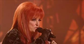 <p>A country music legend, Wynonna Judd, gave a phenomenal performance at the People&rsquo;s Choice Country Music Awards, leaving everyone in the room on their feet, applauding and shouting for more.</p>

<p>Country music is a diverse and wide-ranging genre. It includes everything from old-school country music like that from Hank Williams, Johnny Cash and Merle Haggard to today's country music. Country musicians such as Sam Hunt, Luke Bryan and Thomas Rhett get a lot of attention today even though it is essentially pop music with a little twang.</p>

<p>Some musicians popular back in the 1990s and earlier are still going strong. Willie Nelson, Dolly Parton and Wynonna Judd are still singing and playing those country tunes. The Judds were and still are one of the biggest names in all of country music.&nbsp;</p>

<p>In a <a href="https://www.youtube.com/watch?v=aqzV2_IJBkc">clip posted on YouTube</a>, Wynonna takes the stage and puts on a heck of a show as she dazzles the studio audience and those watching at home while singing&nbsp; &ldquo;I Saw the Light&rdquo; and &ldquo;No One Else on Earth.&rdquo;&nbsp;</p>

<p>&ldquo;No one else on earth<br />
Could ever hurt me<br />
Break my heart the way you do<br />
No one else on Earth&rdquo;</p>

<p>Unlike many musicians who dance, twist and flip about the stage during their performance, Wynonna only needs to stand in front of a microphone to show that she&rsquo;s still got it. Her voice still sounds terrific after all these years of performing and turning out hit after hit. The audience wholeheartedly agrees. They are on their feet, singing and dancing throughout her 5-minute performance.</p>

<p>With such a strong and surprising performance like this, hopefully, Wynonna will have many more years of taking the stage and sharing her beautiful voice with audiences to come. Even those not country music or Wynonna Judd fans will conclude that she sounded great.</p>

<p><em><a href="https://www.godtube.com/bible/psalms/95-1">Psalm 95:1</a> &ldquo;O come, let us make songs to the Lord; sending up glad voices to the Rock of our salvation.&rdquo;</em></p>
