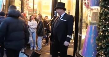 <p>A doorman outside a store in Dublin, Ireland, used his musical talents to spread Christmas cheer as he sang a classic from the legendary Bing Crosby.</p>

<p>Christmas is one of the most special times of the year. It&rsquo;s a season that comes with its own treasured, time-honored traditions. People also seem to go out of their way to spread happiness and joy, which can come in a variety of ways. Someone may unexpectedly help an individual struggling financially. Others may even break out into song and dance, bringing a smile to the faces of everyone in earshot.</p>

<p>A <a href="https://www.youtube.com/watch?v=n3k91duFyeI">clip posted on YouTube</a> shows how one man in Ireland brought Christmas cheer and happiness to those by singing Bing Crosby&rsquo;s beloved classic &ldquo;White Christmas.&rdquo;</p>

<p>The video begins with the familiar tune playing as a doorman, dressed to the nines, stands outside the Brown Thomas store on Grafton Street in Ireland&rsquo;s capital city. Several customers file out of the store as many others stand nearby, ready to take in the doorman&rsquo;s Christmas-themed musical performance.</p>

<p>Soon after the musically gifted doorman starts singing the Christmas tune, the camera turns and captures the massive crowd who has gathered outside the store.&nbsp;</p>

<p>But the beautiful singing is only half of the show for the crowd. A second doorman treats a young woman to a dance as they twist and twirl together to the lovely performance.&nbsp;</p>

<p>At approximately the 2-minute mark in the clip, the singing doorman incorporates choreography into the mix. He soon has the adoring crowd, who has gathered to watch, dancing with him. Everyone takes two quick shuffles to the left and then two swiftly paced moves to the right.&nbsp;</p>

<p>The crowd erupts into a loud, collective round of applause, showing their appreciation for the two men&rsquo;s efforts. What a lovely performance that surely brought a smile to the face of anyone lucky enough to have witnessed it in person.</p>

<p><em><a href="https://www.godtube.com/bible/john/14-27">John 14:27</a> &ldquo;May peace be with you.; my peace I give to you: I give it not as the world gives. Let not your heart be troubled; let it be without fear.&rdquo;</em></p>
