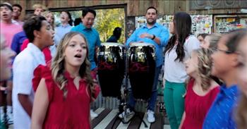 <p>Several immensely talented children gave a toe-tapping and energetic performance of an already upbeat and beloved Christmas tune.&nbsp;</p>

<p>The Christmas season is a terrific, joyous and, arguably, the best time of the year. It&rsquo;s a period intended to celebrate, remember and honor the birth of Jesus Christ. Christ&rsquo;s entrance into the world changed the course of history forever, providing hope for anyone and everyone.</p>

<p>The hope that Christ&rsquo;s birth, and later His death and resurrection, brought to a lost and hurting world is not limited to one specific group of people. Instead, Christ&rsquo;s love, mercy and forgiveness transcends race, gender, culture and language.&nbsp;</p>

<p>As such, many people all over the world celebrate and recognize the birth of Jesus Christ. Christ came to save all from their sins. The Bible states that all who confess their sins and believe, in their heart, that Jesus Christ is Lord will have everlasting life with Him.&nbsp;</p>

<p>In a <a href="https://www.youtube.com/watch?v=m3pWtaXDY_I">clip posted on YouTube</a>, the One Voice Children&rsquo;s Choir performs the Spanish-English Christmas song &ldquo;Feliz Navidad.&rdquo; It&rsquo;s a beautiful and unbelievably catchy cover.&nbsp;</p>

<p>All who listen and watch this entire clip will be in a decidedly better mood. There is no possible way, after listening to those splendid and delightful harmonies, anyone could be in a poor frame of mind.&nbsp;</p>

<p>&ldquo;I wanna wish you a merry Christmas<br />
I wanna wish you a merry Christmas<br />
I wanna wish you a merry Christmas<br />
From the bottom of my heart&rdquo;</p>

<p>Not only are the vocal performances tremendously upbeat and catchy, but the video&rsquo;s visuals only add and enhance the song&rsquo;s already joyous, celebratory sound.&nbsp;</p>

<p>People are dancing, swaying and moving around to the beat of the music. Bright, vibrant colors and smiles abound in the video for this energetic Christmas cover. The video is a picture-perfect representation of the joyful celebration that is Christmas Day and the entire Christmas season.&nbsp;</p>

<p><em><a href="https://www.godtube.com/bible/romans/10-9">Romans 10:9</a> &ldquo;Because, if you say with your mouth that Jesus is Lord, and have faith in your heart that God has come back from the dead, you will have salvation.&rdquo;</em></p>
