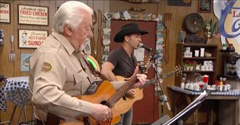 <p>Capture the perfect vision of the afterlife as you watch this clip, &lsquo;Outskirts Of Heaven&rsquo; by Craig Campbell, as he performs as Larry&rsquo;s Country Diner.&nbsp;</p>

<p>I doubt there was a dry eye in the room. The song &lsquo;Outskirts Of Heaven&rsquo; describes rural life just outside of heaven&rsquo;s gates with an old dirt road and a fishing pond. He sings of blue skies, dogwood trees, and how he would gladly trade a mansion for a farmhouse with a porch swing.</p>

<p>I don&rsquo;t know about you, but there&rsquo;s something about standing in the wilderness and witnessing God&rsquo;s fingerprints all over creation. Nature is one of God&rsquo;s primary ways of nourishing our souls and connecting with us. His presence is etched into the wind, the wide open skies, and rippling rivers.&nbsp;</p>

<p>Throughout the Good Book, we can find hundreds of verses about the skies, the moon and stars, ocean waves, and fields of flowers. Nature reveals God&rsquo;s glory and power; it&rsquo;s one of the reasons we are drawn to the great outdoors. Because of our love of nature, especially rural life, Craig captured God&rsquo;s creation in a poetic fashion.&nbsp;</p>

<p>&ldquo;When I die I wanna live on the outskirts of Heaven<br />
Where there's dirt roads for miles and hay in the fields, and fish in the river<br />
Where there's dogwood trees, and honeybees blue skies, and green grass forever<br />
So, Lord, when I die, I wanna live on the outskirts of Heaven&rdquo;</p>

<p>Normally, when we imagine what heaven will be like, we think of streets of gold, mansions, and pearly gates. We know every creature will praise God as we take in the splendor of Jesus sitting on the throne. To be sure, there will be no way to describe what it will be like, but like Craig, I hope there are open skies and long winding roads.&nbsp;</p>

<p><em><a href="https://www.godtube.com/bible/psalms/8">Psalm 8:1,3-4</a> &ldquo;O Lord, our Lord, your majestic name fills the earth! Your glory is higher than the heavens&hellip; When I look at the night sky and see the work of your fingers &mdash; the moon and the stars you set in place &mdash; what are mere mortals that you should think about them, human beings that you should care for them?&rdquo;</em></p>
