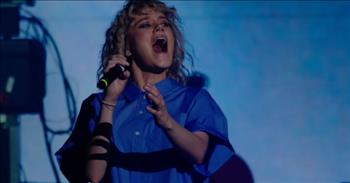 <p>Savor this video of &ldquo;What a Beautiful Name,&rdquo; sung and shared by TAYA (Taya Smith-Gaukrodger) and featuring Andr&eacute; Valad&atilde;o. What a treat it is!</p>

<p><a href="https://hillsong.com/contributors/contributor/taya-gaukrodger/">TAYA</a>, a former member of Hillsong United (a.k.a. United), was born Lismore, Australia, the daughter of a church elder and worship leader. You can hear an accent at times during this stunning performance; however, &ldquo;performance&rdquo; doesn&rsquo;t seem quite the right word. TAYA completely engages her audience in the process of worship.</p>

<p>Dressed simply in an oversized sky blue blouse&mdash;the style oddly similar to a prison uniform&mdash;and black pants and combat boots, TAYA wears modest make-up and simple, delicate jewelry. Her look and presence are unique. Throughout the 8-minute performance, TAYA is feminine, exuberant, passionate, and clearly ready for battle in the name of Jesus.</p>

<p>She is joined at 2:50 by Pastor Andr&eacute; Valad&atilde;o. <a href="https://authentic-facts.com/andre-valadao/">Andr&eacute; Valad&atilde;o</a> (45) is a Brazilian Singer, Songwriter, Worship Pastor, and TV Presenter. Together, they lead the congregants of Lagoinha Baptist Church (at <a href="https://www.facebook.com/lagoinhaorlandochurchofficial/videos/805406753869047/">Virada 23</a> in Orlando); Andr&eacute; is Lagoinha&rsquo;s lead pastor. Lagoinha Baptist Church hosts 82,000 people and 45 services every week! &nbsp;&nbsp;&nbsp;</p>

<p>Let&rsquo;s take a closer look at TAYA and Andr&eacute;&rsquo;s inspiring collaboration.&nbsp;</p>

<p>TAYA stands against the sky of blue, and the white lights look like stars. This rendition of &ldquo;What a Beautiful Name&rdquo; is unlike any we&rsquo;ve heard. At 1:15, TAYA emphasizes &ldquo;nothing&rdquo; with a definitive gesture. And, at 1:50, she shouts out the word &ldquo;greater&rdquo; and changes up the words &ldquo;separate us now&rdquo; sung just seconds later.&nbsp;&nbsp;</p>

<p>TAYA invites Pastor Andr&eacute; onto the stage to &ldquo;lead your people&rdquo; in worship. From here, the singers sing alternately in English and Portuguese&mdash;delivering the good news that is understood in all languages and around the globe.</p>

<p>His name is beautiful! At 3:30, we get a view of the crowd, standing with raised hands and voices, as they sing of Heavenly Father. As the music builds, TAYA bounces as if unable to contain the joy she feels.&nbsp;</p>

<p>At the 6-minute mark, the song winds down, and TAYA leads a prayer. Pastor Andr&eacute; echoes each line in his native tongue. Surely, worshippers feel nearer to Heaven as they join TAYA and Pastor Andr&eacute; in praise.&nbsp;</p>

<p>What a blessing it is!</p>

<p><em>My ambition has always been to preach the Good News where the name of Christ has never been heard, rather than where a church has already been started by someone else. <a href="https://www.godtube.com/bible/romans/15-20">Romans 15:20</a></em></p>
