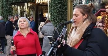<p>Two musically gifted young women, Allie Sherlock and Leila Jane, put on a fantastic and stunning performance of an Elvis Presley classic on the side of the street.</p>

<p>Elvis Presley is a massive, legendary figure in the world of entertainment. Even decades after his death, his songs and movies are still widely heard and seen. His iconic and beloved tunes have received the cover treatment from scores of musicians, including two young street performers.</p>

<p>In a <a href="https://www.youtube.com/watch?v=tQAoM6Y5Zbg">clip posted on YouTube</a>, the two bundled-up musicians treat the crowd who has gathered to listen and unsuspecting passersby to a rendition of &ldquo;Heartbreak Hotel.&rdquo; It&rsquo;s such a terrific and delightful cover that the &ldquo;King of Roll and Roll&rdquo; would have likely given his wholehearted approval.</p>

<p>&ldquo;Well, since my baby left me<br />
I found a new place a new place to dwell<br />
It&rsquo;s down at the end of Lonely Street<br />
At the Heartbreak Hotel&rdquo;</p>

<p>During their performance, Allie strums on the guitar and provides vocals, while Leila also shoulders some singing responsibilities. Allie kicks off the song by belting out the tune&rsquo;s catchy and memorable opening verse. Leila comes in on the second verse, demonstrating her magnificent singing voice.</p>

<p>Both young women sound fantastic. Each even uses a bit of growl/southern drawl in their voice that Elvis uses to great effect in his version.&nbsp;</p>

<p>The two talented women have picked up quite the crowd. About halfway through the clip, the camera swings around and shows the sizable audience that has gathered to watch Allie and Leila&rsquo;s Elvis Presley cover.</p>

<p>Elvis Presley is often covered and imitated but will never be replicated. He was a one-of-a-kind entertainer who could sing, dance and even act. His many films and songs are legendary.&nbsp;</p>

<p>But despite all that, Leila And Allie&rsquo;s cover of &ldquo;Heartbreak Hotel&rdquo; is still thoroughly impressive. Even the most diehard of Elvis fans will appreciate their rendition.&nbsp;</p>

<p><em><a href="https://www.godtube.com/bible/psalms/95-1">Psalm 95:1</a> &ldquo;O come, let us make songs to the Lord; sending up glad voices to the Rock of our salvation.&rdquo;</em></p>

