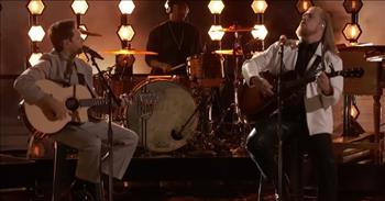 <p>Two talented musicians, Niall Horan and The Voice winner Huntley, joined forces for a stunning duet, performing Bob Dylan&rsquo;s classic &ldquo;Knockin&rsquo; on Heaven&rsquo;s Door.&rdquo;</p>

<p>Not many singer-songwriters have had even a tenth of the impact of Bob Dylan. Throughout his career, which has spanned decades, he has produced dozens of classic and memorable hit tunes. Additionally, he is consistently considered one of the greatest songwriters of all time. His songs, even though they may be decades old, are still constantly covered by other artists.</p>

<p>In a <a href="https://www.youtube.com/watch?v=nBgEI7UwH7E">clip posted on YouTube</a>, Niall and Huntley cover one of Bob&rsquo;s many classic songs, &ldquo;Knockin&rsquo; on Heaven&rsquo;s Door.&rdquo; Both sit on stools in the center of the stage as they strum on guitars and belt out the classic lyrics, first written and performed by Bob Dylan.&nbsp;</p>

<p>&ldquo;Mama take this badge from me<br />
I can&rsquo;t use it anymore<br />
It&rsquo;s getting dark, too dark to see<br />
Feels like I&rsquo;m knocking on Heaven&rsquo;s door&rdquo;</p>

<p>To put it simply, Niall and Huntley&rsquo;s cover is outstanding. Their voices work well together, perfectly complementing one another. Huntley&rsquo;s scratchy and raspy tone makes for an excellent pairing with Niall&rsquo;s more clean-cut sound.&nbsp;</p>

<p>Niall and Huntley&rsquo;s rendition is worth multiple listens. It&rsquo;s such a calming and soothing cover. The studio audience seemed to agree as well. At the end of their duet, the studio audience erupted in a thunderous round of applause.</p>

<p>Others agreed as well. Several people who commented on the video&rsquo;s YouTube expressed their astonishment at the awe-inspiring cover of the Bob Dylan classic.</p>

<p>&ldquo;This was the best rendition of Knockin on Heaven&rsquo;s Door I&rsquo;ve ever listened to. With Niall&rsquo;s story teller (sic) voice and Huntley&rsquo;s husky tone and those high notes and harmonies, it&rsquo;s just incredible. Great job gentlemen! I&rsquo;d listen to a full album of your collaboration any day,&rdquo; one person wrote.</p>

<p>&ldquo;Cried the first time I heard them and now I listen to it daily. Sooooo good!!!&rdquo; <a href="https://www.youtube.com/watch?v=nBgEI7UwH7E&amp;lc=UgyWjnkjjMSJOg2Wixd4AaABAg">another individual added</a>.</p>

<p><em><a href="https://www.godtube.com/bible/psalms/95-1">Psalm 95:1</a> &ldquo;O come, let us make songs to the Lord; sending up glad voices to the Rock of our salvation.&rdquo;</em></p>
