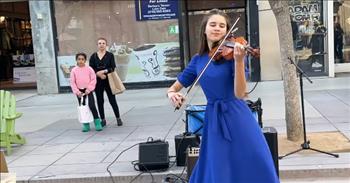 <p>An immensely talented young woman, Karolina Protsenko, put her mesmerizing skills on the violin on full display with her stunning and awe-inspiring cover of Roy Orbison&rsquo;s classic hit, &ldquo;Oh, Pretty Woman.&rdquo;</p>

<p>Throughout the history of music, plenty of tunes have received the cover treatment. Likely, any song with even a smidgen of familiarity among the general public has been covered once or twice. Covers are a terrific way to pay homage to an artist and for an unknown musician to build and gain an audience.</p>

<p>In a <a href="https://www.youtube.com/watch?v=RL8y-a15xMQ">clip posted on YouTube</a>, Karolina, well-known for her dazzling violin covers, went with a beloved song covered thousands of times over the years. Her rendition of Roy Orbison&rsquo;s &ldquo;Oh, Pretty Woman&rdquo; is an utter delight and treat.&nbsp;</p>

<p>As she expertly strums and plucks her violin and joyfully dances about the busy street, you can&rsquo;t help but hum and possibly sing out the memorable lyrics. Her playing and love of performing are infectious!</p>

<p>&ldquo;Pretty woman, walkin&rsquo; down the street<br />
Pretty woman the kind I like to meet<br />
Pretty woman, I don&rsquo;t believe you, you&rsquo;re not the truth<br />
No one could look as good as you, mercy&rdquo;</p>

<p>&ldquo;Oh, Pretty Woman&rdquo; is still heard on the radio, in television commercials and often during hilarious montage sequences in films. It&rsquo;s a tune that many people know, and even if they don&rsquo;t know that they know it, they&rsquo;ve heard it before, in some form or fashion.&nbsp;</p>

<p>By the end of the clip, those gathered to take in Karolina&rsquo;s fantastic display of talent and enthusiasm give the young woman a round of applause.&nbsp;</p>

<p>A handful of others showed their appreciation, support and approval on the video&rsquo;s YouTube page, writing comments.</p>

<p>&ldquo;A thoroughly beautiful rendition of a wonderful song and tune. A true timeless classic,&rdquo; <a href="https://www.youtube.com/watch?v=RL8y-a15xMQ&amp;lc=UgwcT-Js9giR95QXgQx4AaABAg">one person posted</a>.&nbsp;</p>

<p>&ldquo;This girl remembers and plays hundreds of songs in public without making any mistakes, amazing!&rdquo; a <a href="https://www.youtube.com/watch?v=RL8y-a15xMQ&amp;lc=UgxhHYypPyVFg6RaokB4AaABAg">second individual added</a>.</p>

<p><em><a href="https://www.godtube.com/bible/psalms/104-33">Psalm 104:33</a> &ldquo;I will make songs to the Lord all my life; I will make melody to my God while I have my being.&rdquo;</em></p>
