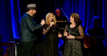 <p>There are some groups that just have a natural knack for unity and precision. The Isaacs&rsquo; are one of them. Check out The Isaac's brilliant cover of &ldquo;It Is Well with My Soul.&rdquo;</p>

<p>Although this concert mainly features Reba McEntire, she actually chooses to step aside and highlight The Isaacs acapella. This becomes very evident why as they begin to sing.&nbsp;</p>

<p>The audience cheers. The Issacs are a family of strong vocalists who are members of the <a href="https://www.opry.com/artists/the-isaacs#:~:text=The%20Isaacs%2C%20a%20multi%2Daward,Yeary%20and%20Rebecca%20Isaacs%20Bowman.">Grand Ole Opry</a>. They begin with one female singing, and the other brother and sister come in with tight harmonies. The trio has such a beautiful tone and sings with such confidence. They put their hearts into the song, and it is evident.&nbsp;</p>

<p>Their trills and sharp punches are high-level talent. As you listen, it will cause you to be in awe of the God who makes it well with our souls because of His love for us. Jesus gives us peace in a dark and hurting world. The Isaacs sing, &ldquo;It is Well With My Soul,&rdquo; with such flare and power that it reminds us of our Savior, even in our most painful moments.</p>

<p>Just when you think you have this song figured out, they take you to new heights with their notes and creative harmonies. The crowd is amazed. The trio finishes out with funky and fresh sounds. It is absolutely intriguing and a phenomenal performance.&nbsp;</p>

<p>At the end of the song, everyone in the audience stands while clapping, and the camera zooms in on Reba, who is clapping while shedding tears from this moving song. They hug and then head off the stage. This is one of the most unique renditions of this classic hymn. It is a blessing to hear.</p>

<p><em>"And the peace of God, which surpasses all understanding, will guard your hearts and your minds in Christ Jesus.&rdquo; <a href="https://www.godtube.com/bible/Philippians/4-7">Philippians 4:7</a></em></p>
